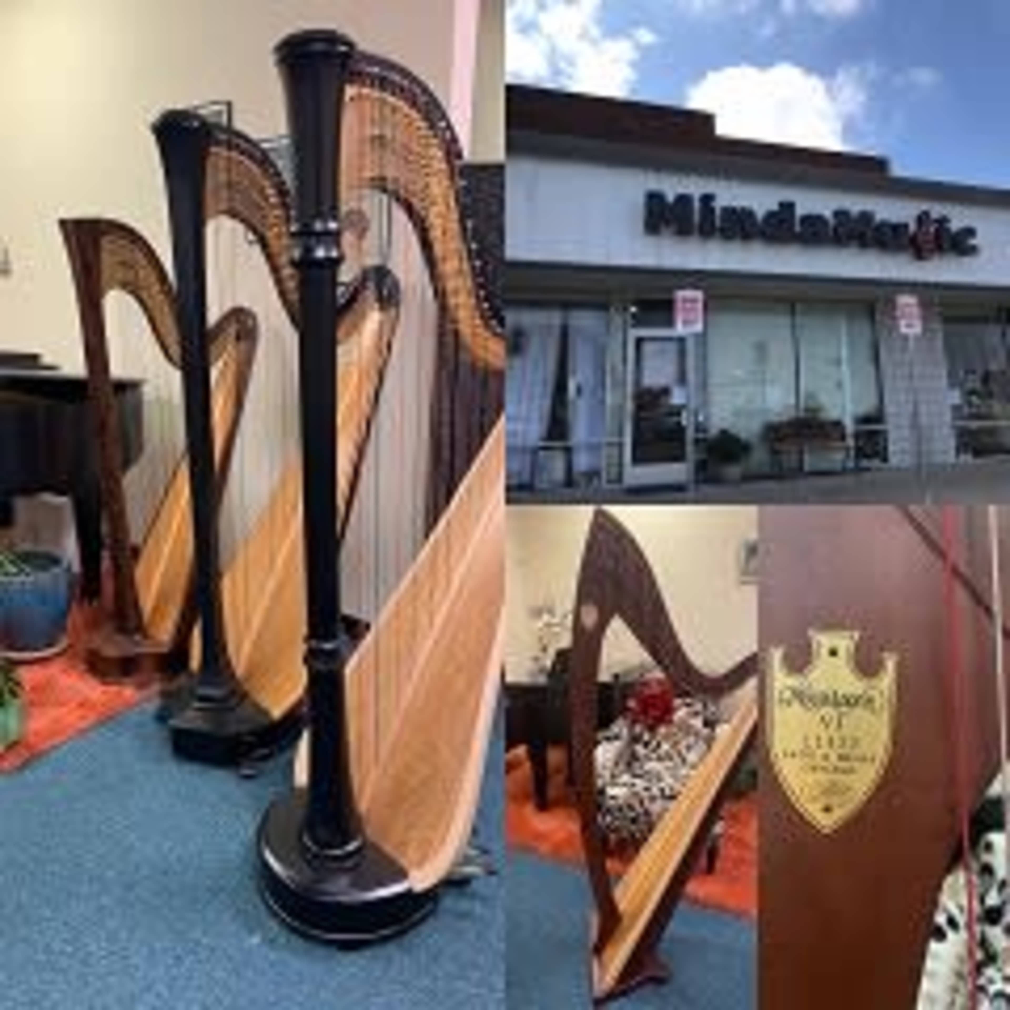 The image features a storefront labeled "Mindful Music" alongside three wooden harps displayed inside a room with blue carpet.