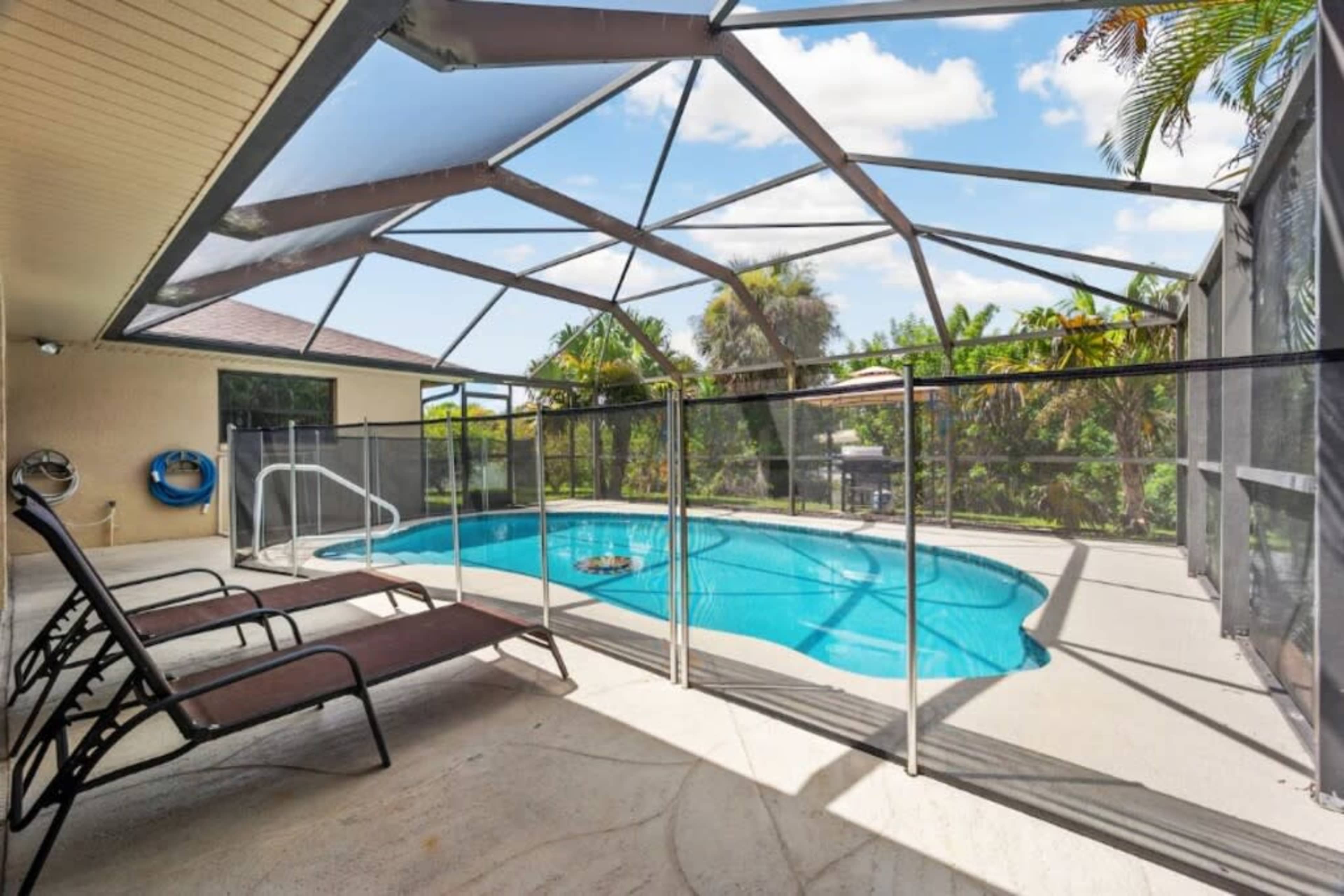 CANAL HOME! WARM PRIVATE POOL! FAMILY MEMORIES! WIFI! GRILL! BABY SUPPLIES! Image in Port Charlotte, Port Charlotte, FL