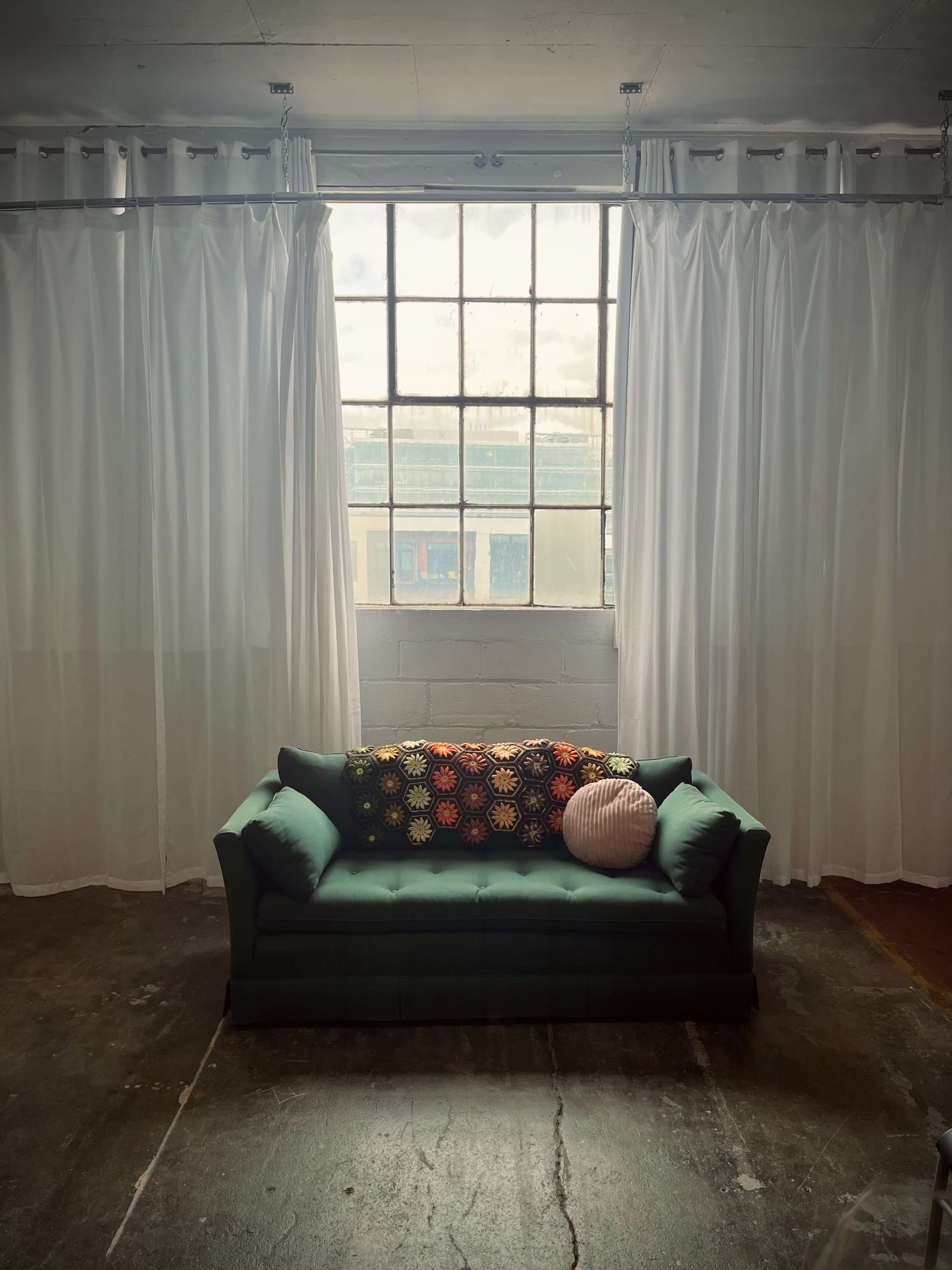Natural Light-Filled Warehouse Studio with Harbor Skyline View Image in Bay View, Milwaukee, WI