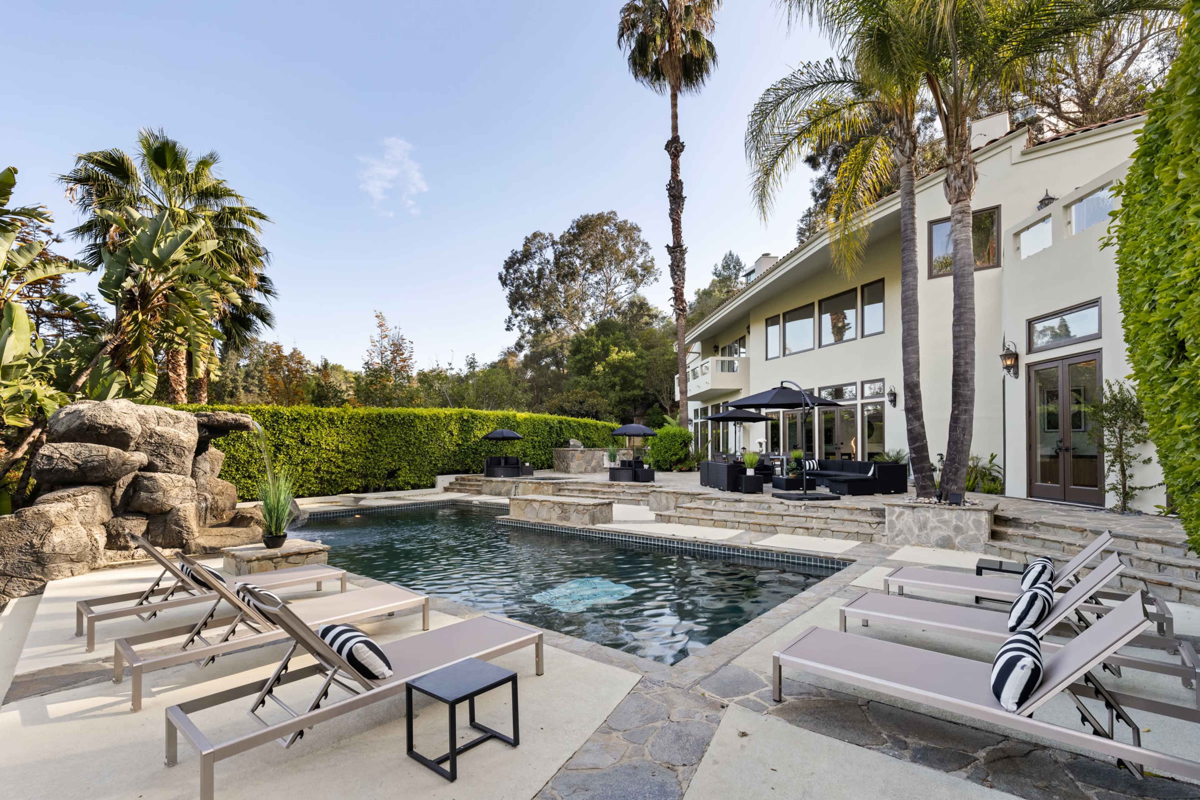 HILLSIDE MODERN PALM COURT PARADISE Image in Bel Air, Los Angeles, CA