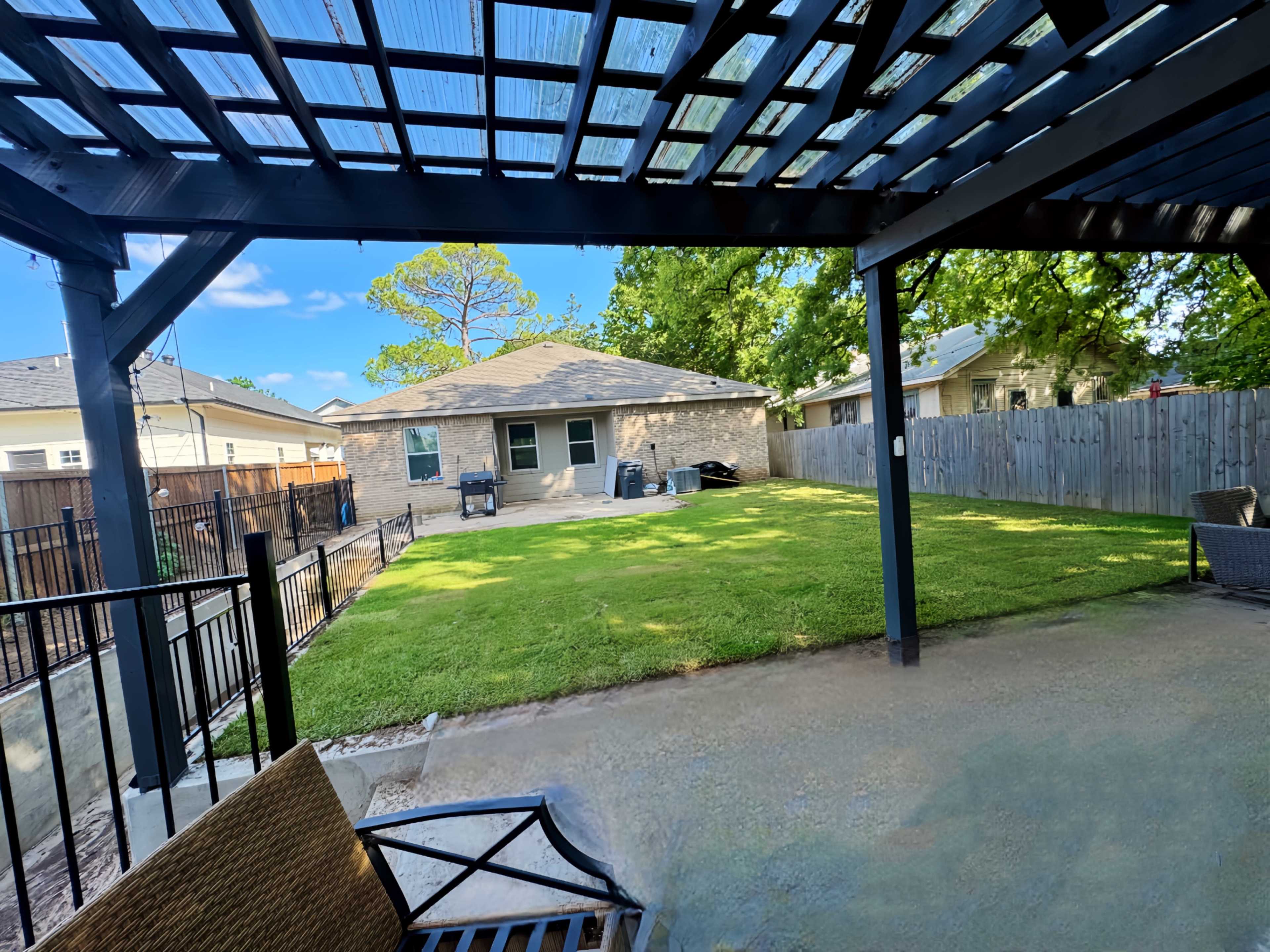 Urban Backyard Oasis with Sunken Lounge + Covered Pergola Image in South Dallas, Dallas, TX