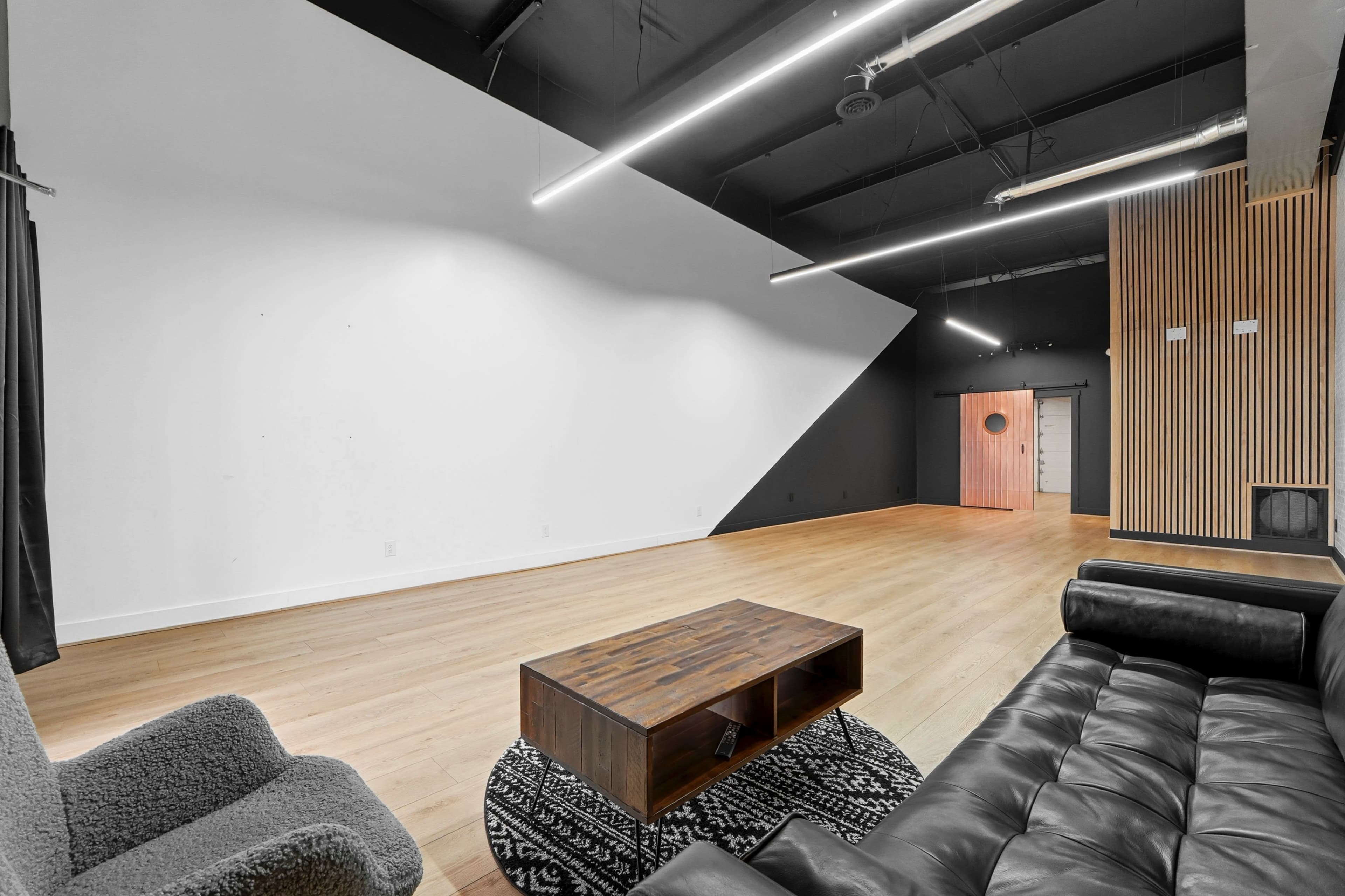 Urban Studio with Modern Wood & Brick Design in Fort Wayne Image in Washington Township, Fort Wayne, IN