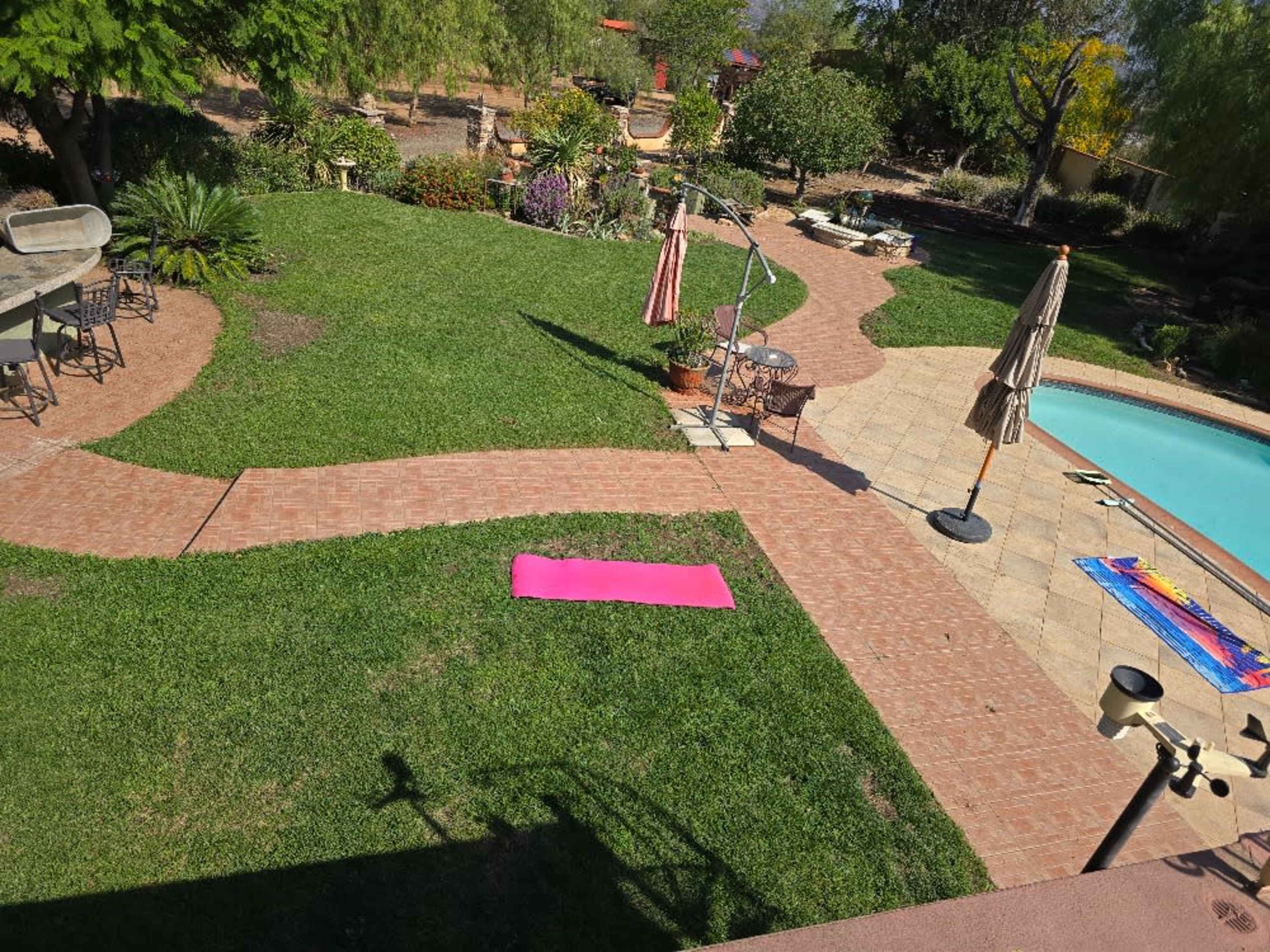 Pool side and grass area 
