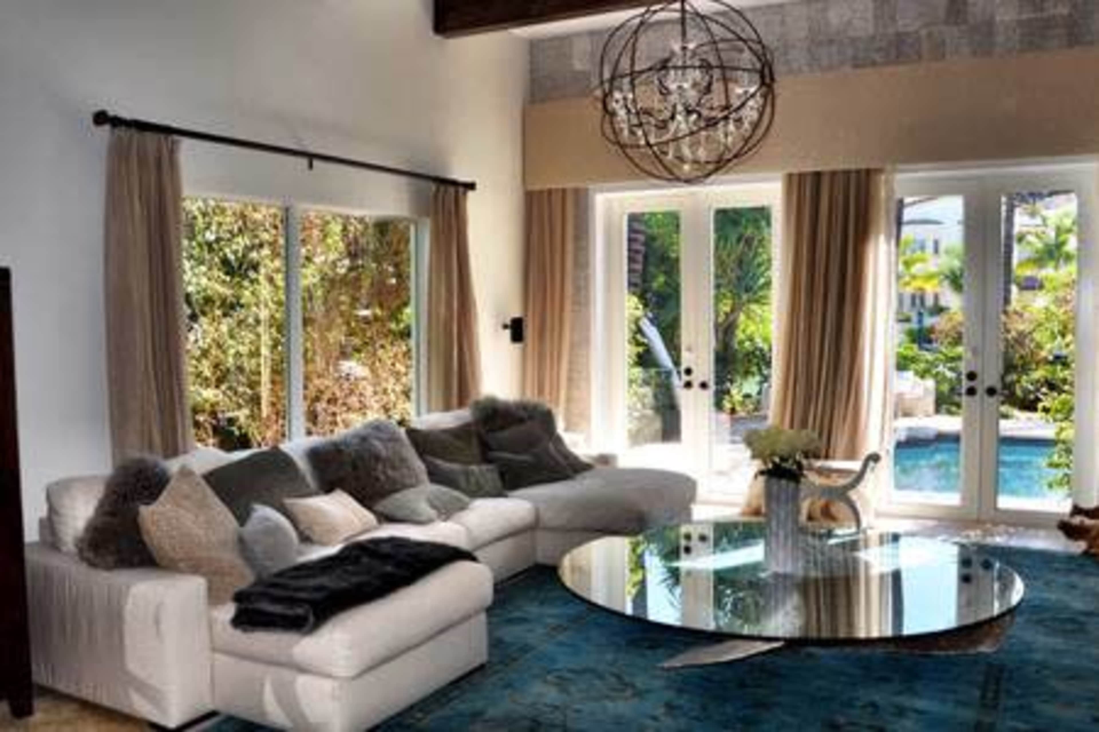 A breathtaking bayfront retreat in a private island with  stunning waterfront views and a serene, meticulously landscaped setting. Image in Bayshore, Miami Beach, FL