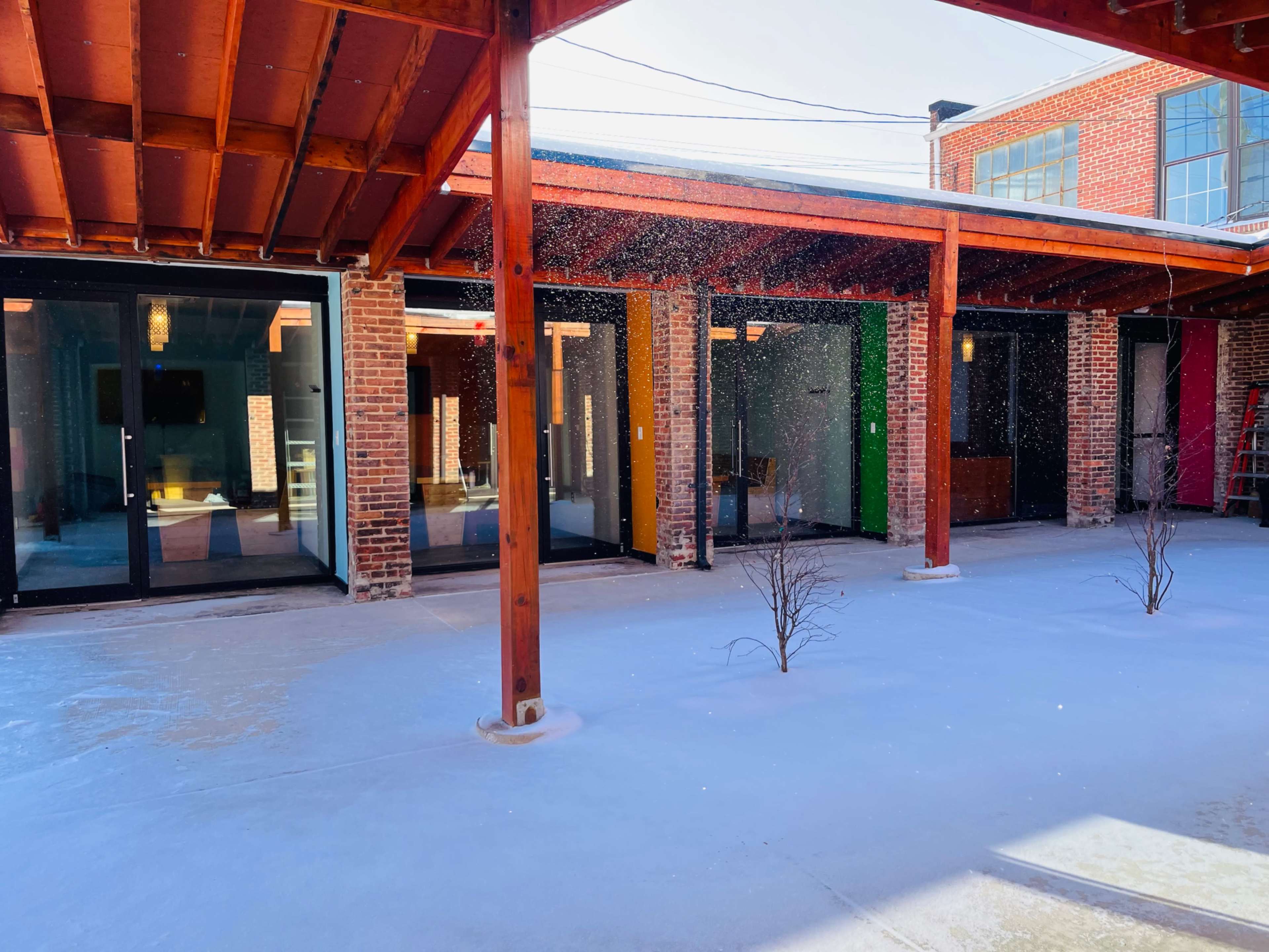 Beautifully retrofitted 150 year-old brick garages. Image in Hampden, Baltimore, MD