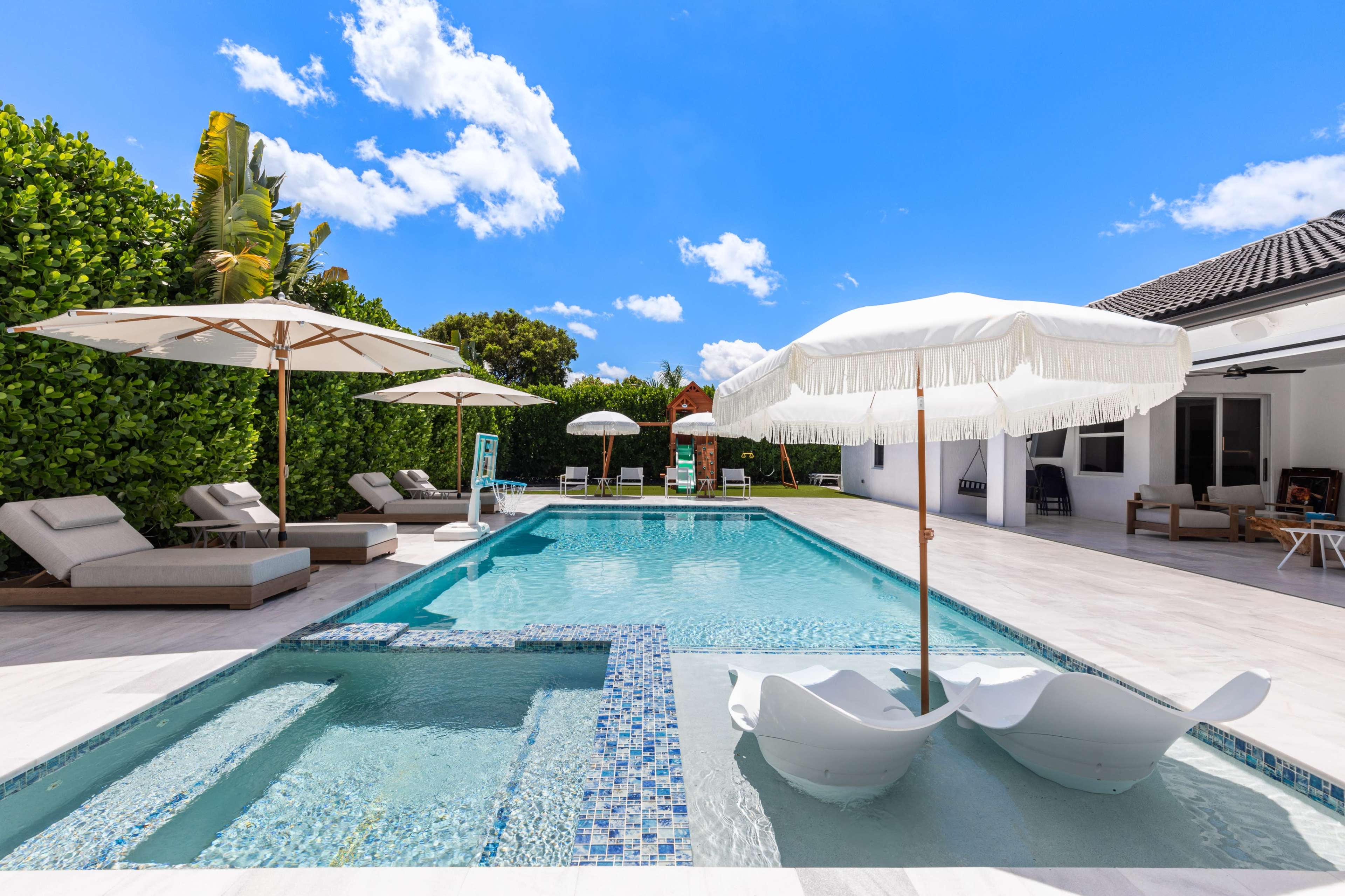 Multi Set Luxe Modern Home with Resort-Style Backyard + Designer Interior Image in , Miami, FL