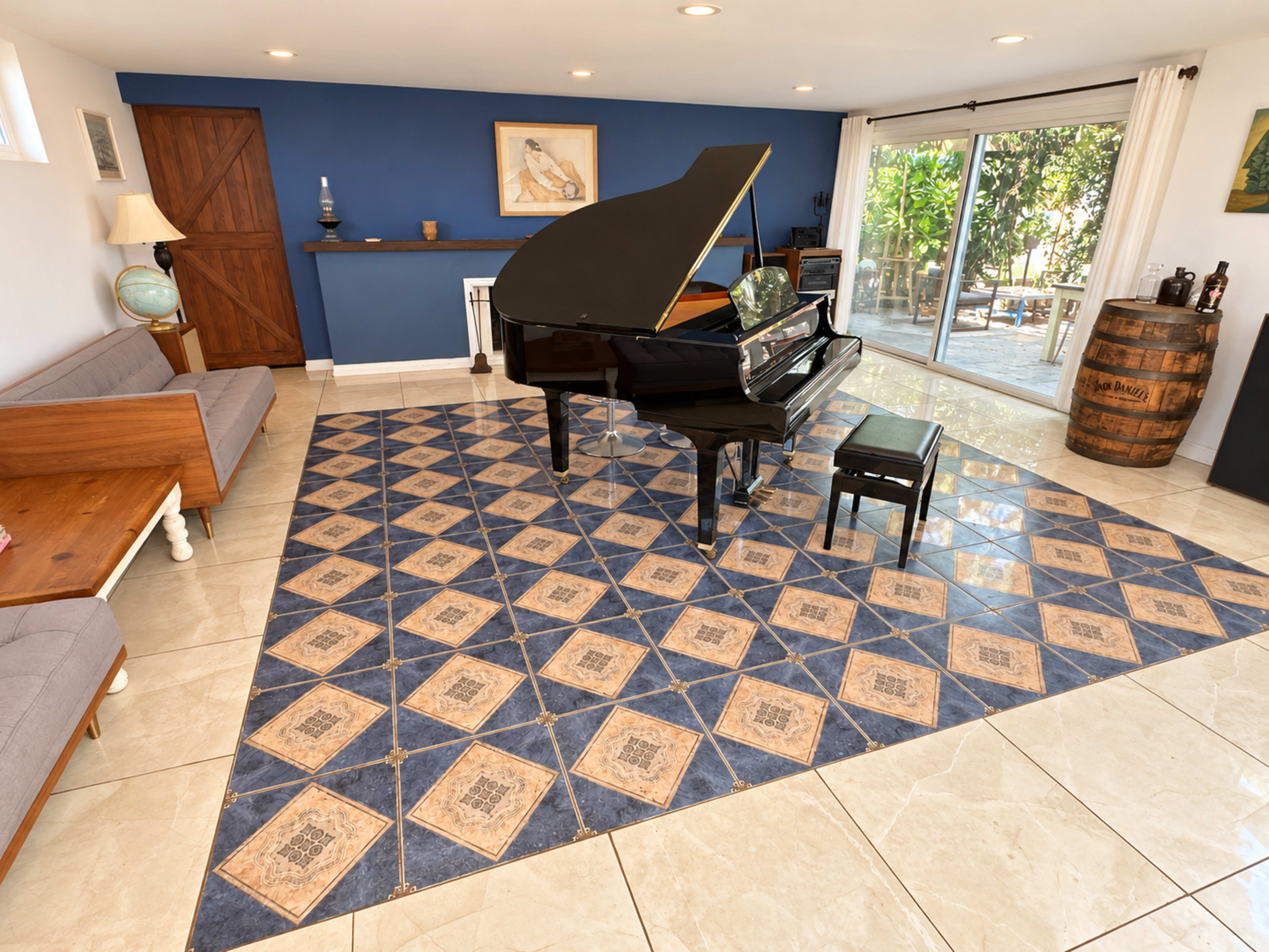 A grand piano is placed on a patterned floor in a bright room with a blue accent wall and large windows leading to an outdoor area.