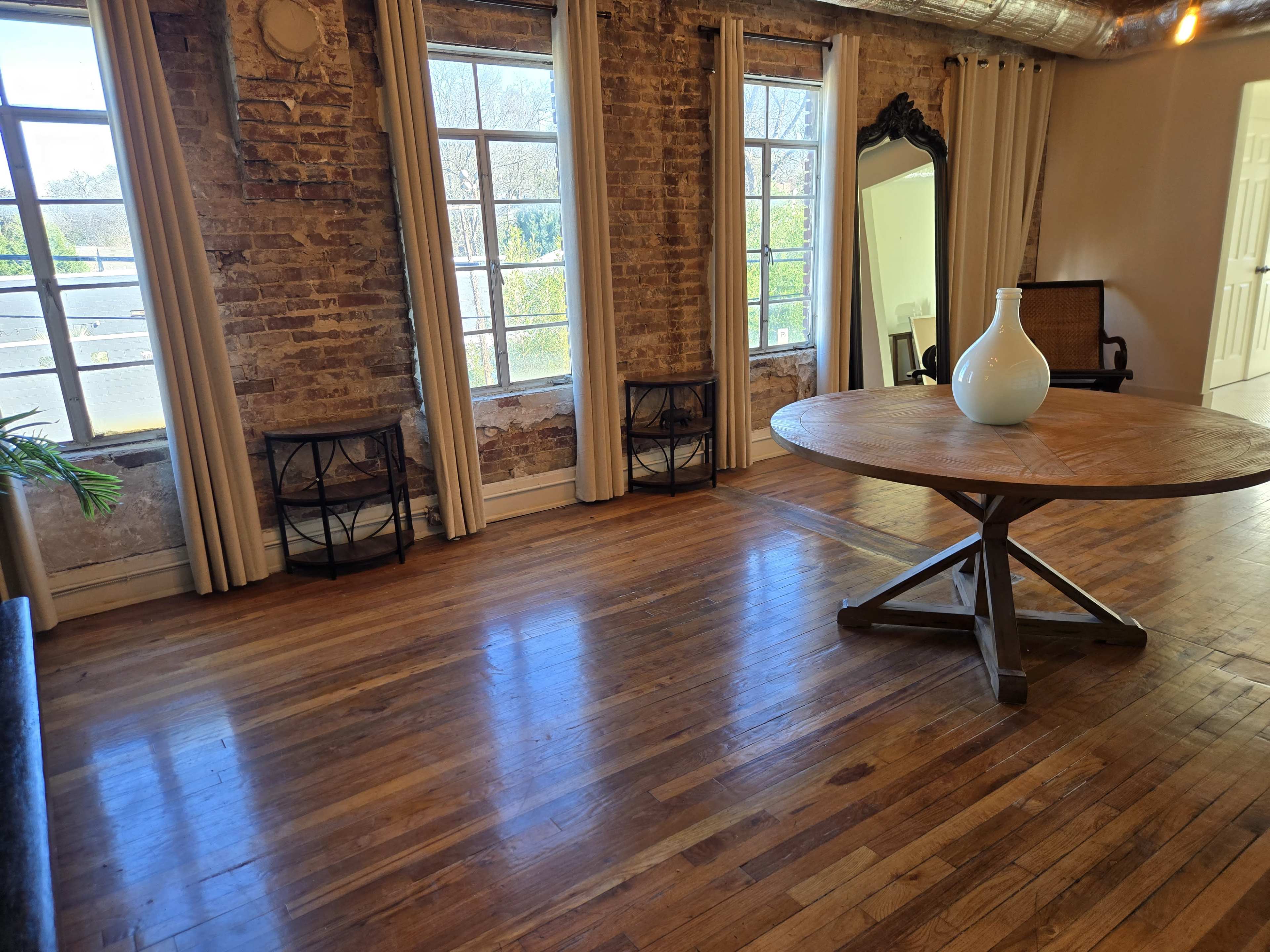 Sunlit Avondale Loft with Exposed Brick and Private Patio Image in East Avondale, Birmingham, AL