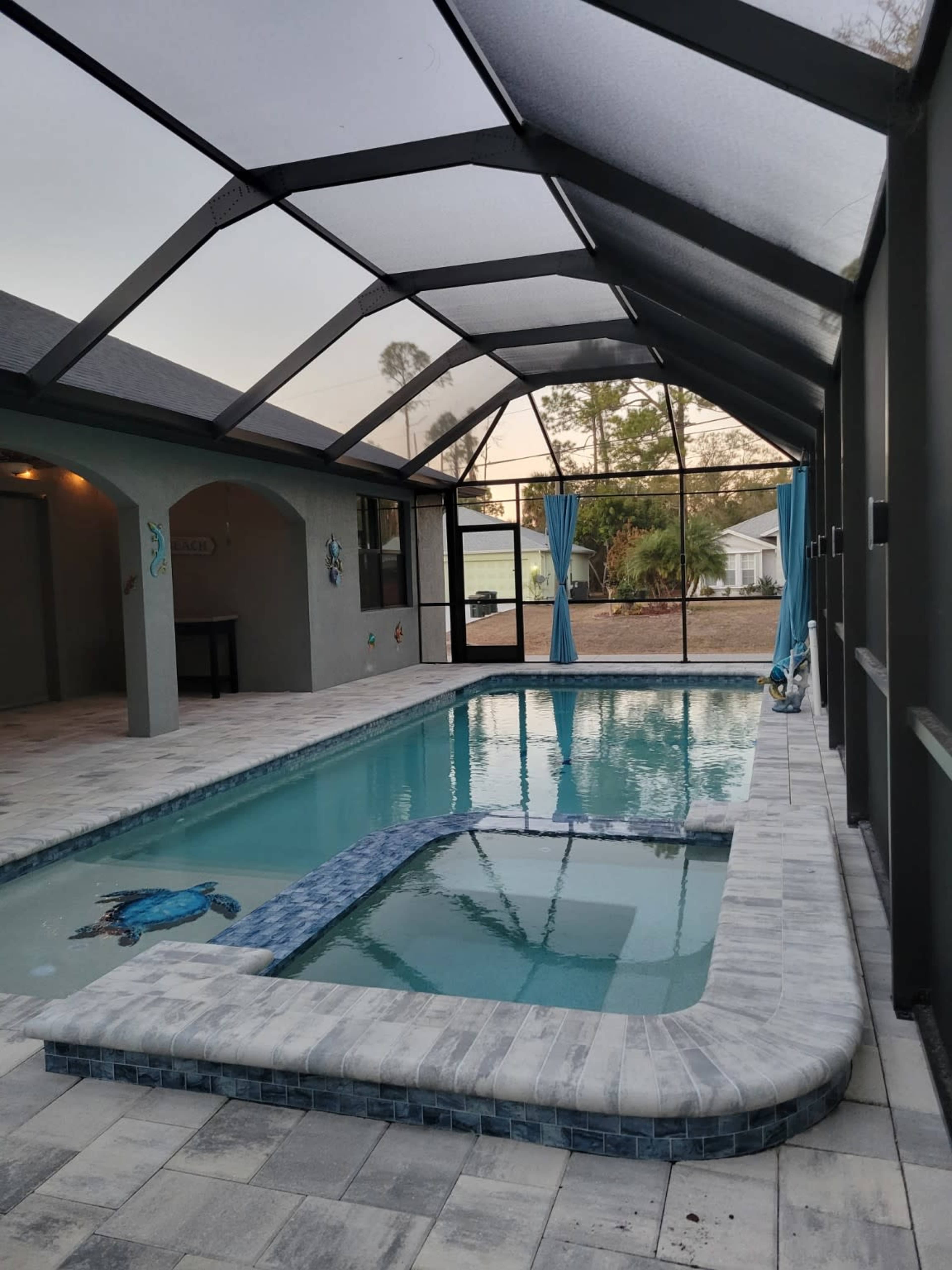 Private Screened Poolside Patio for Photos & Video Shoots Image in North Port, North Port, FL