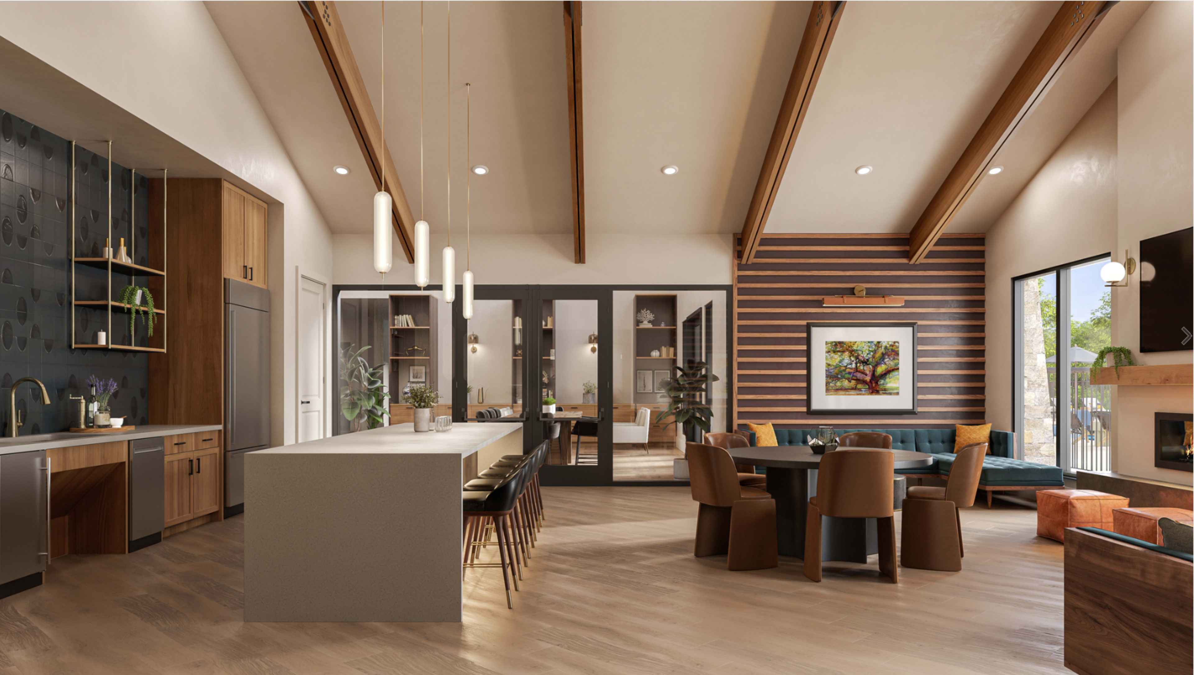 The image shows a modern, open-concept living space with a kitchen island, dining area, and a seating area featuring large windows and wooden beams.