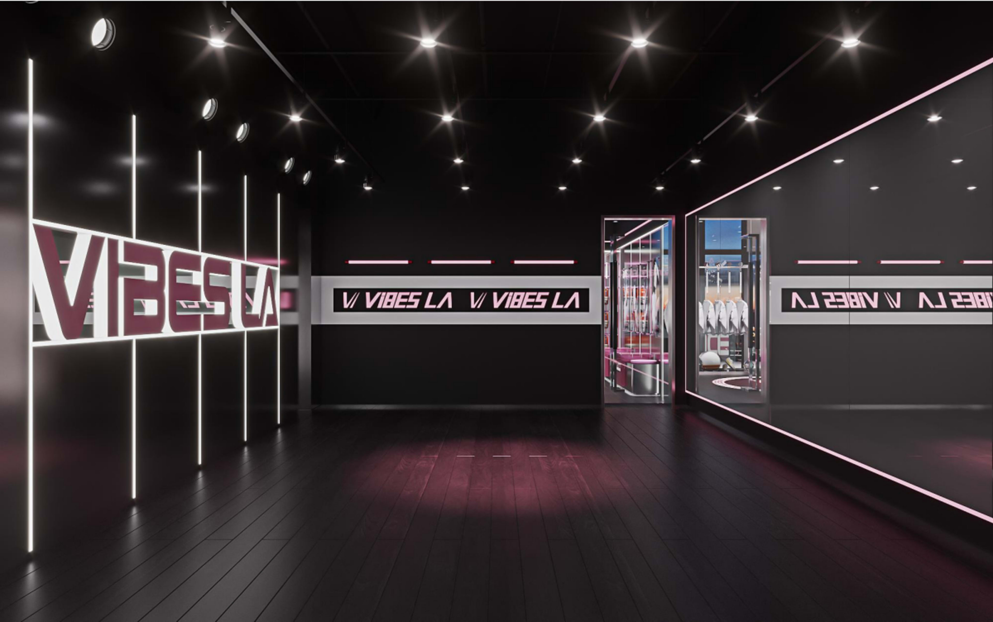 The image shows a sleek interior of a modern space with walls featuring bold neon signage reading "VIBES LA" and mirrored sections.