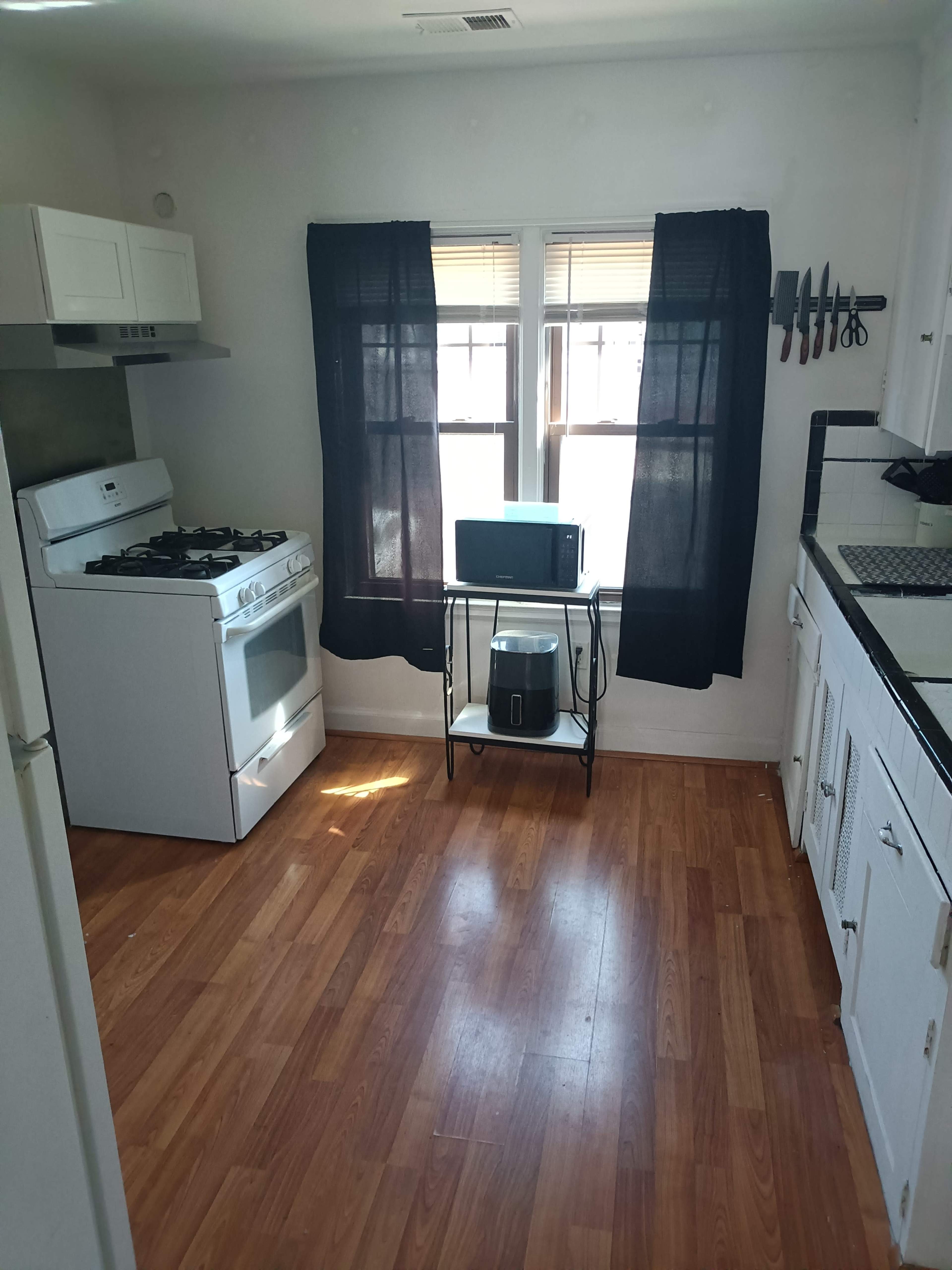 Charming Morningside Flat with Plenty of Light | Perfect for Creatives Image in Morningside, Detroit, MI