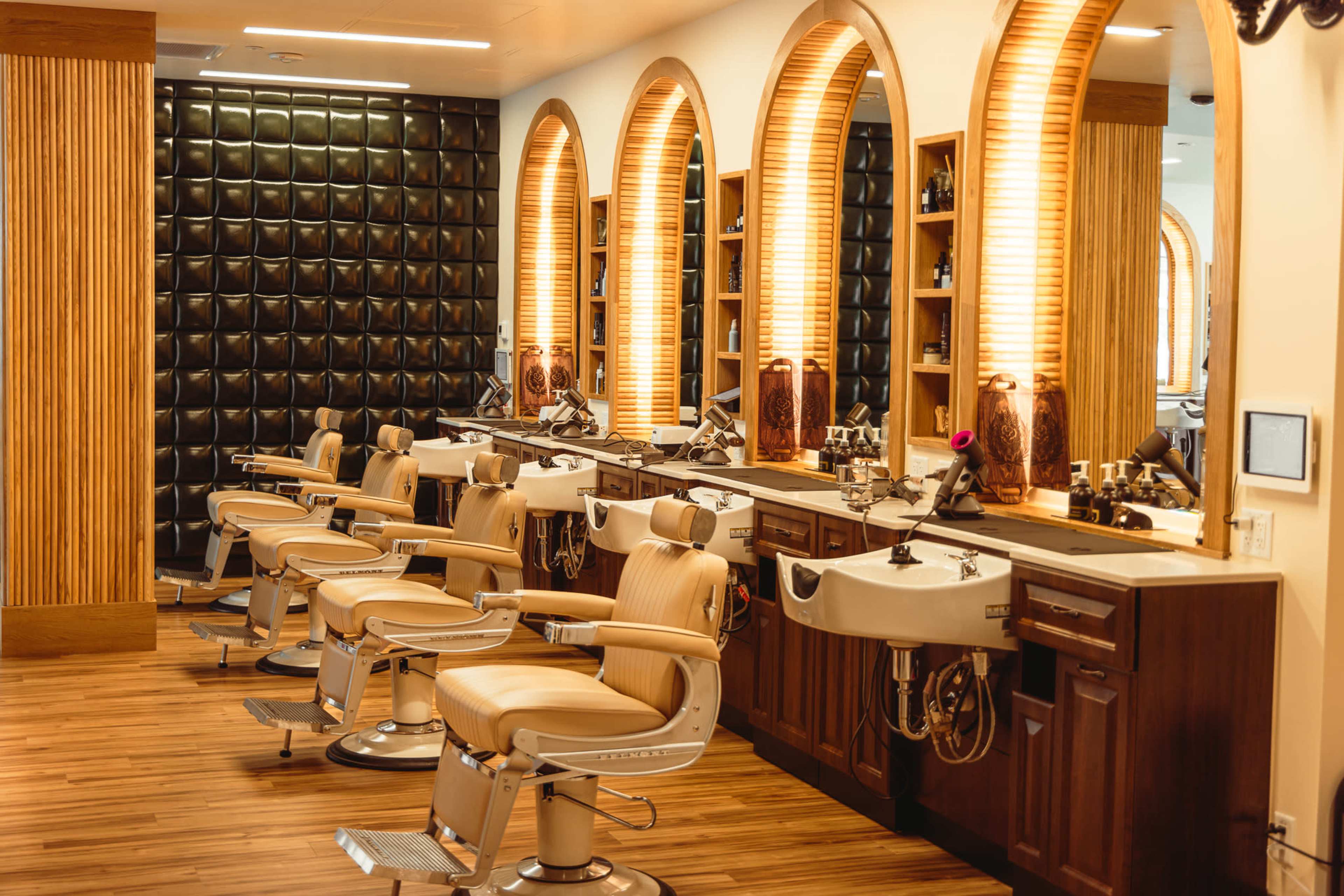 Stylish Barbershop in RiNo — Curved White Wall, Photography Lighting, and Modern Vintage Vibe Image in Five Points, Denver, CO