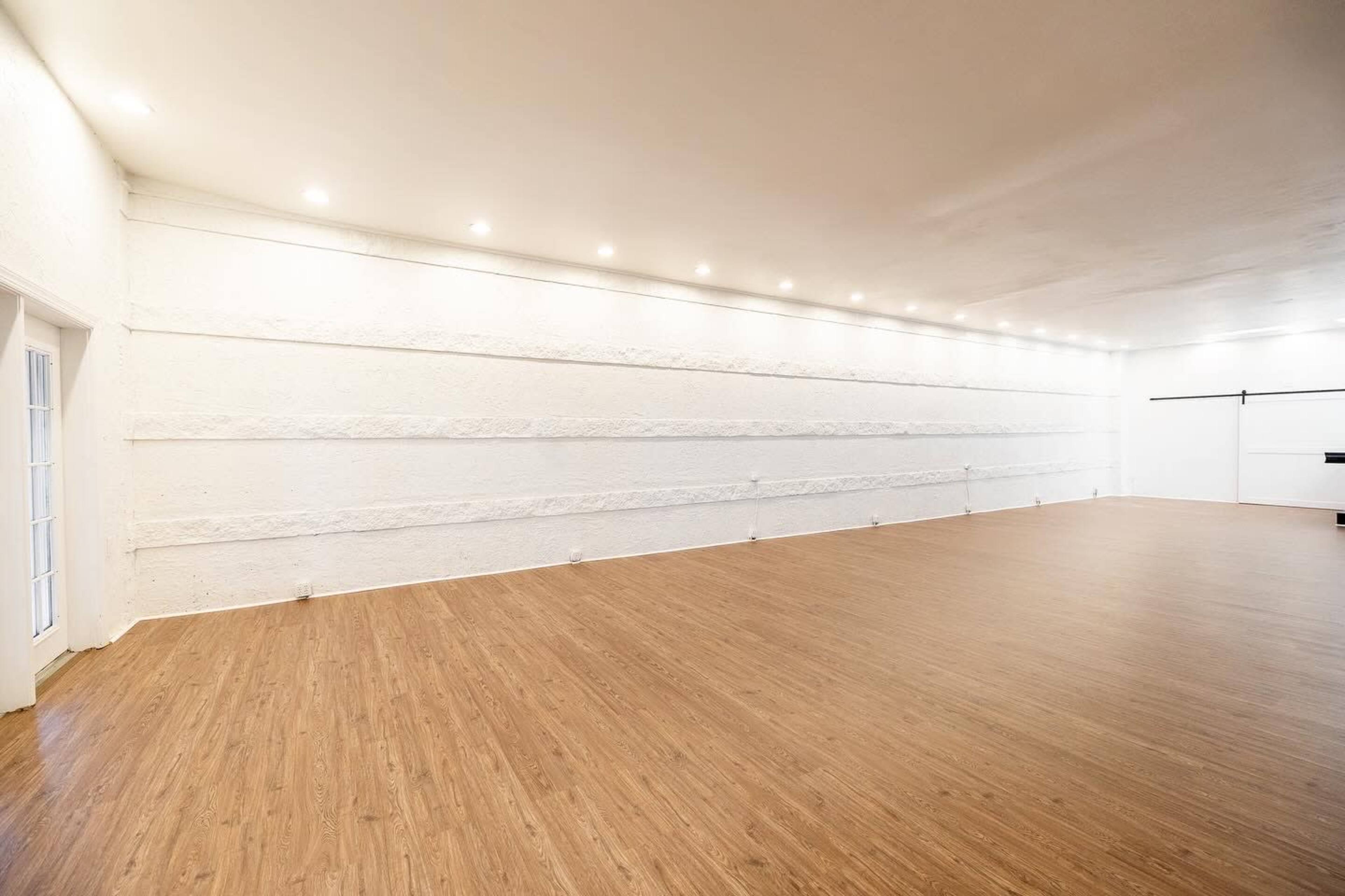 Swanky black and white themed venue with light oak flooring Image in North Virginia Beach, Virginia Beach, VA