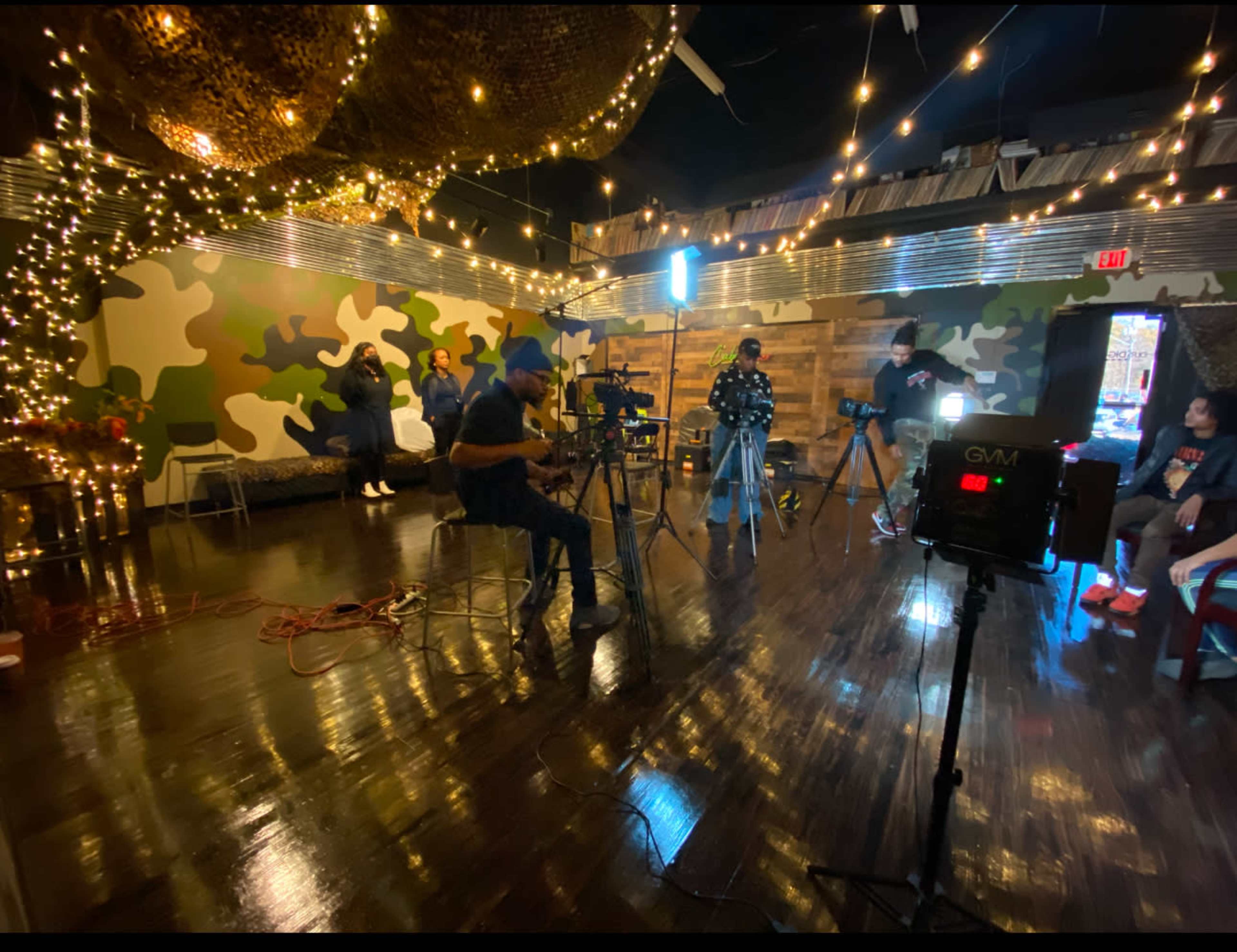 Indoor/Outdoor Ambience, prop log cabin with porch/stage, venue Image in Winston-Salem, Winston-Salem, NC