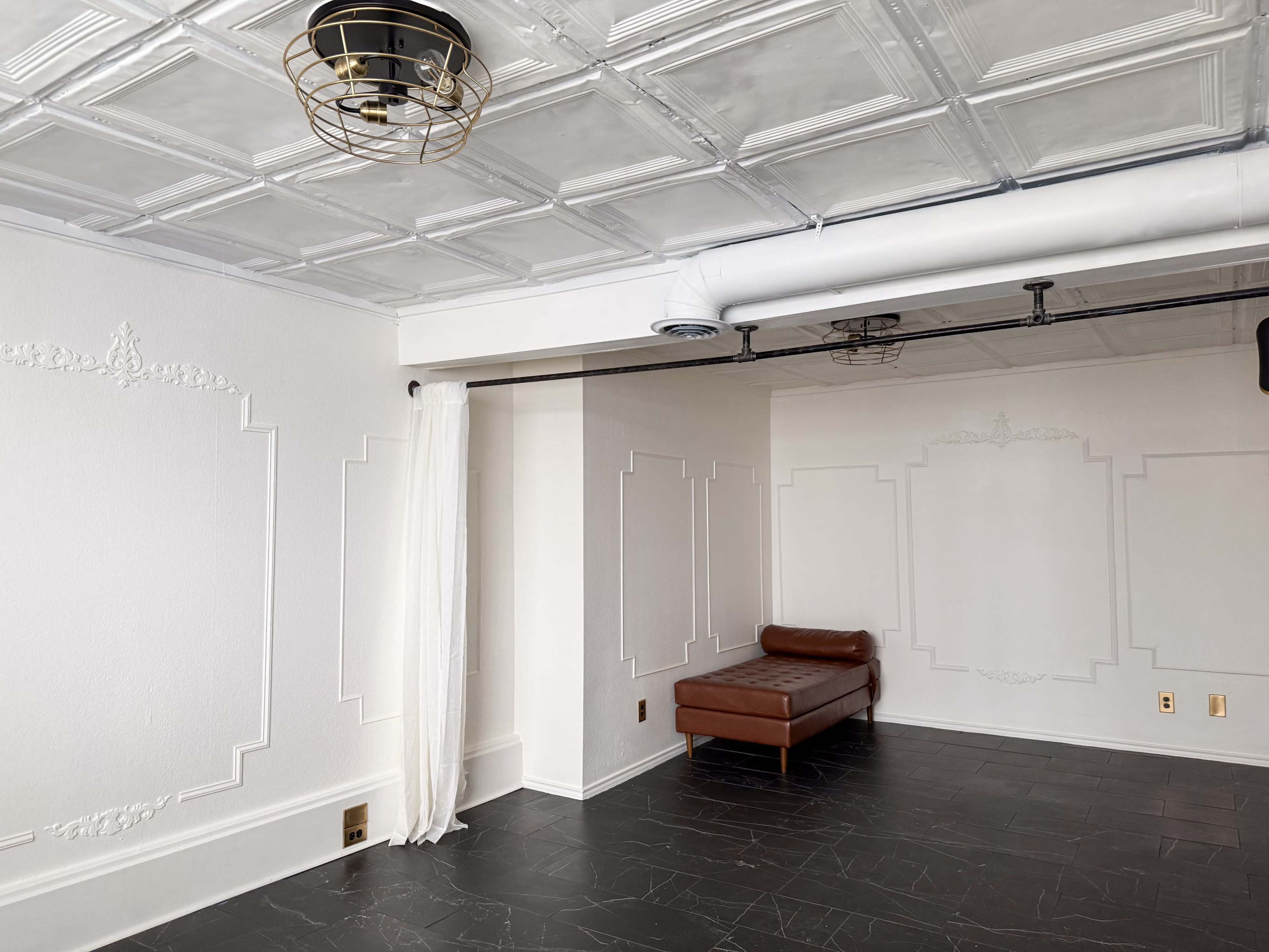 The Parisian Parlor at Archive Haus | a Natural Light all white European Style Studio Steps from the Denton Square Image in Denton, Denton, TX