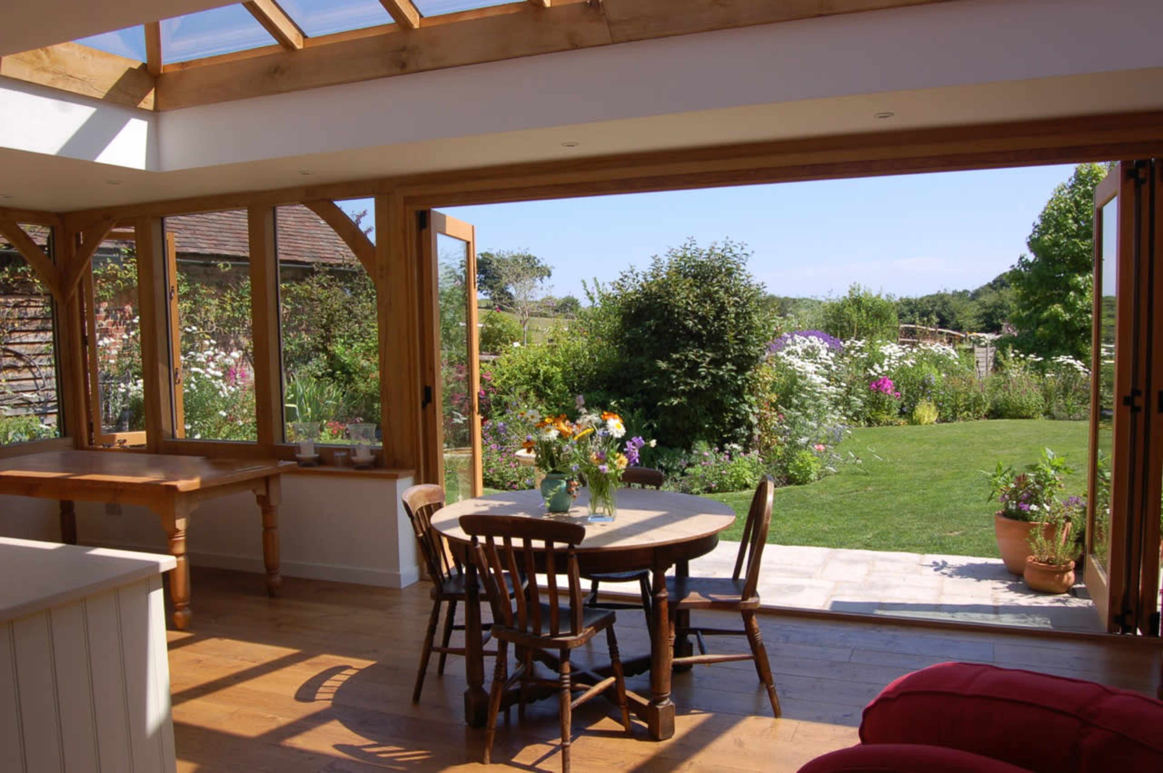English Country Gardens with 17th century timber framed Sussex farmhouse. Image in Barcombe, Barcombe, ENG