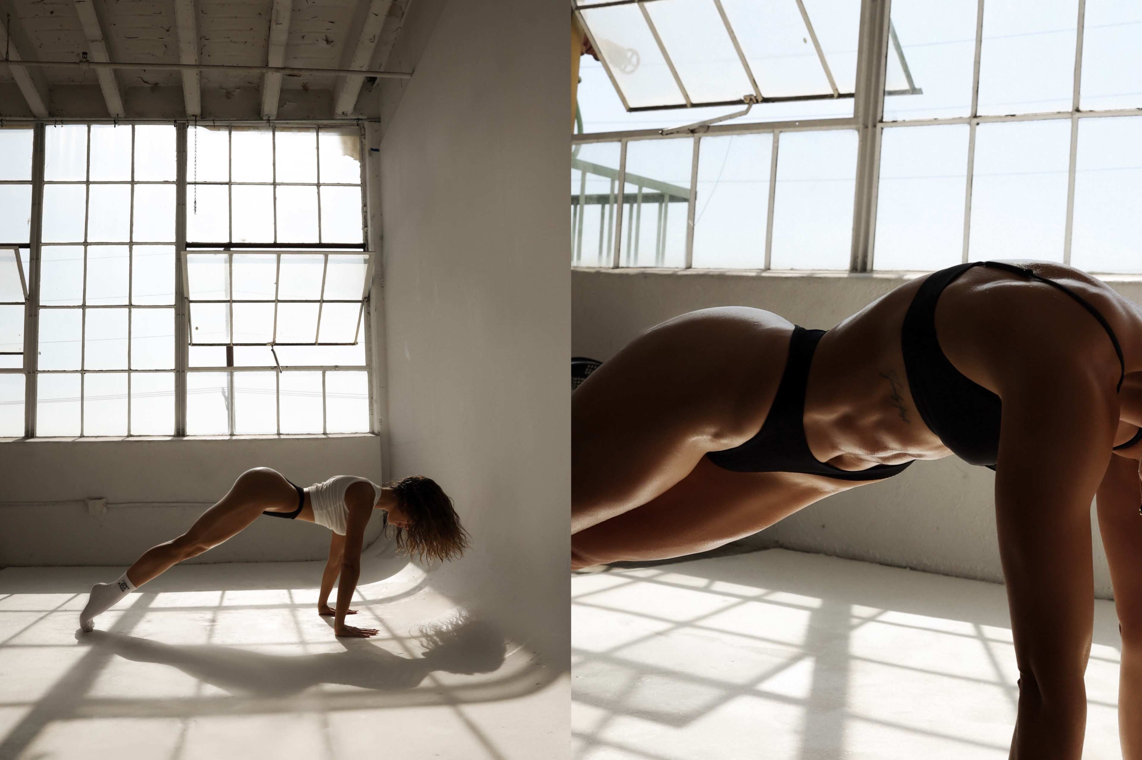 A person performs a fitness exercise in a bright, sunlit space with large windows.