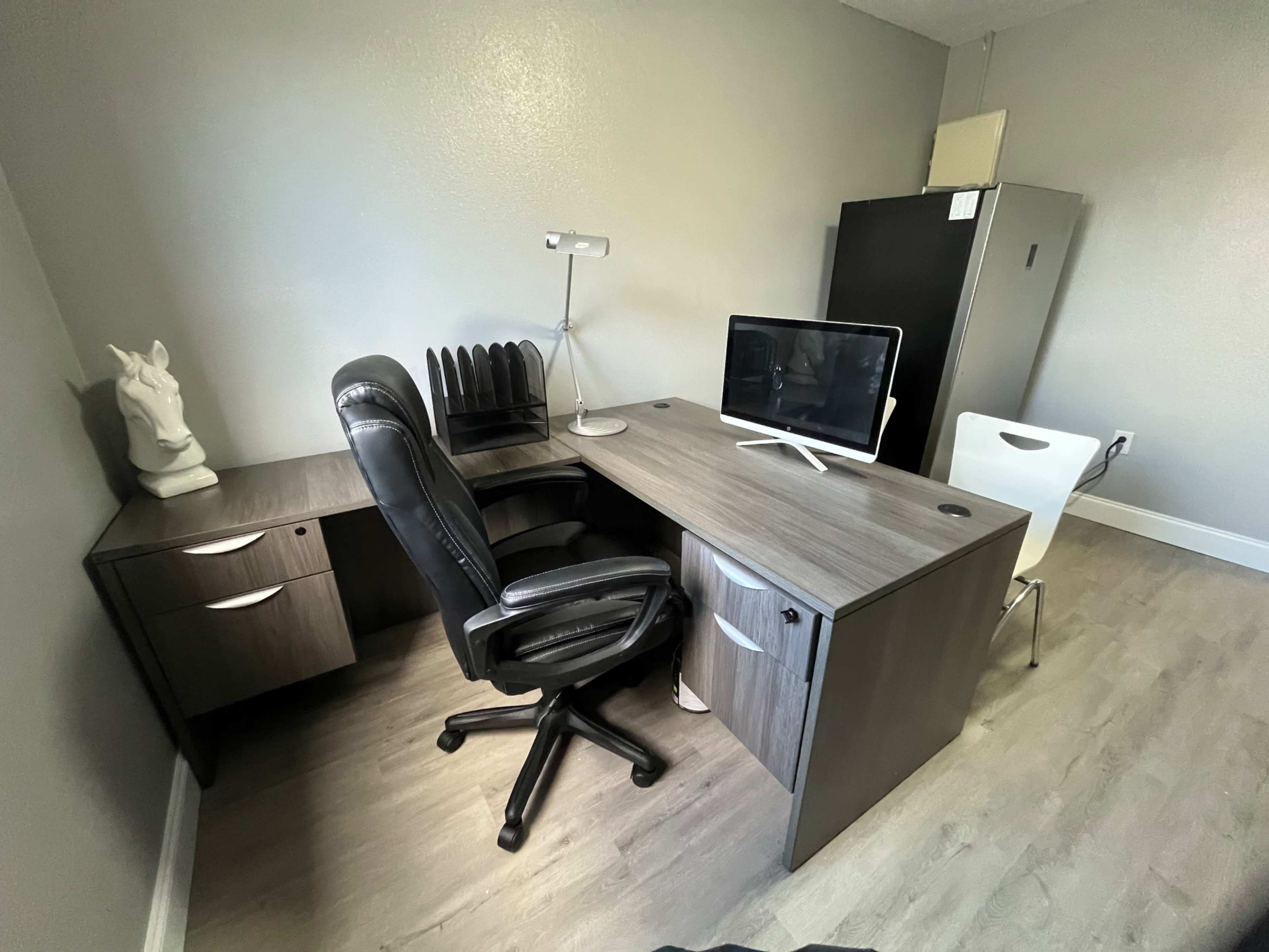 Modern office space with refrigerator/freezer Printer and couch Image in Temple Terrace, Temple Terrace, FL