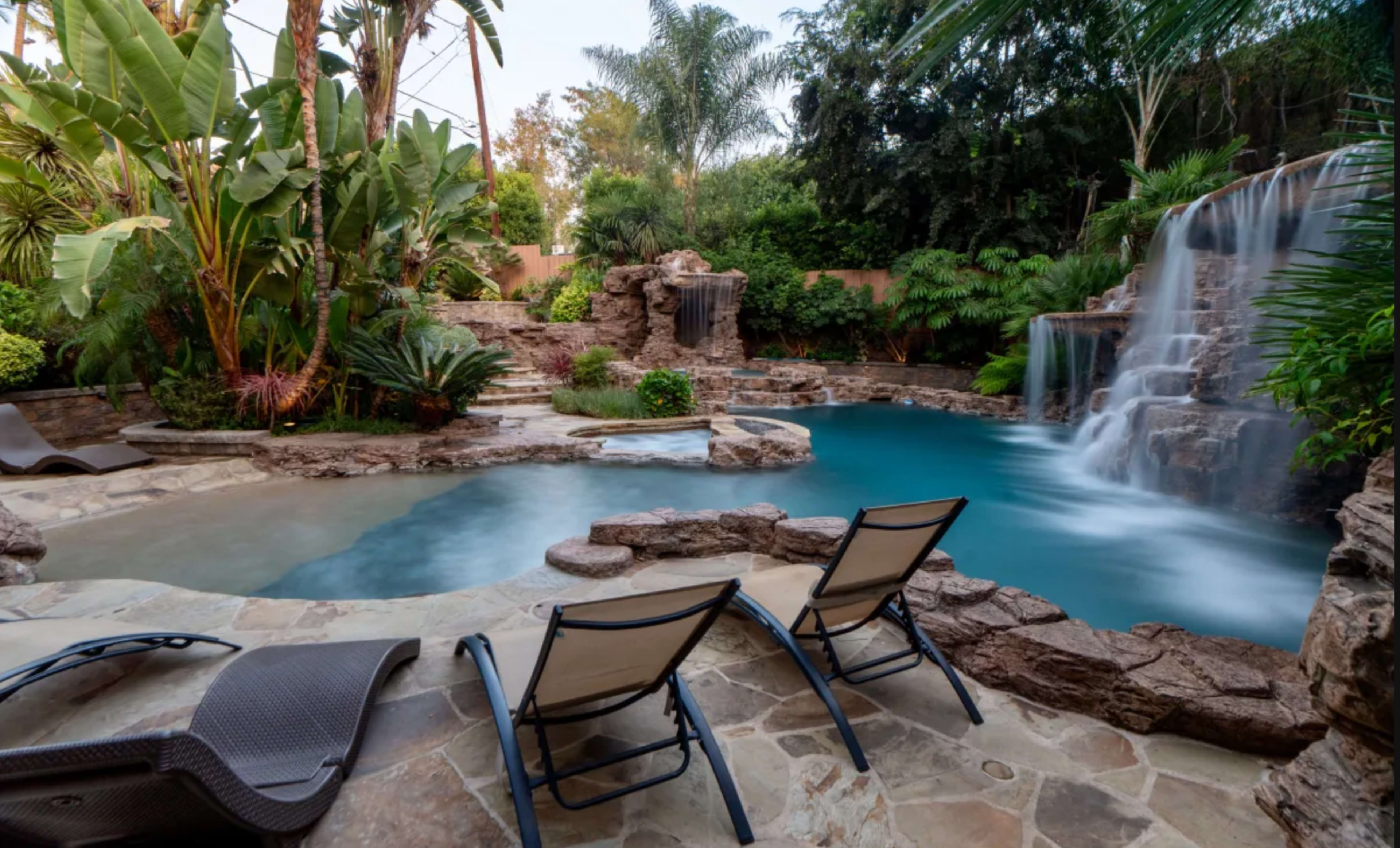 Beautiful Vegas type pool with waterfall and hot tub. Image in Valley Village, Valley Village, CA