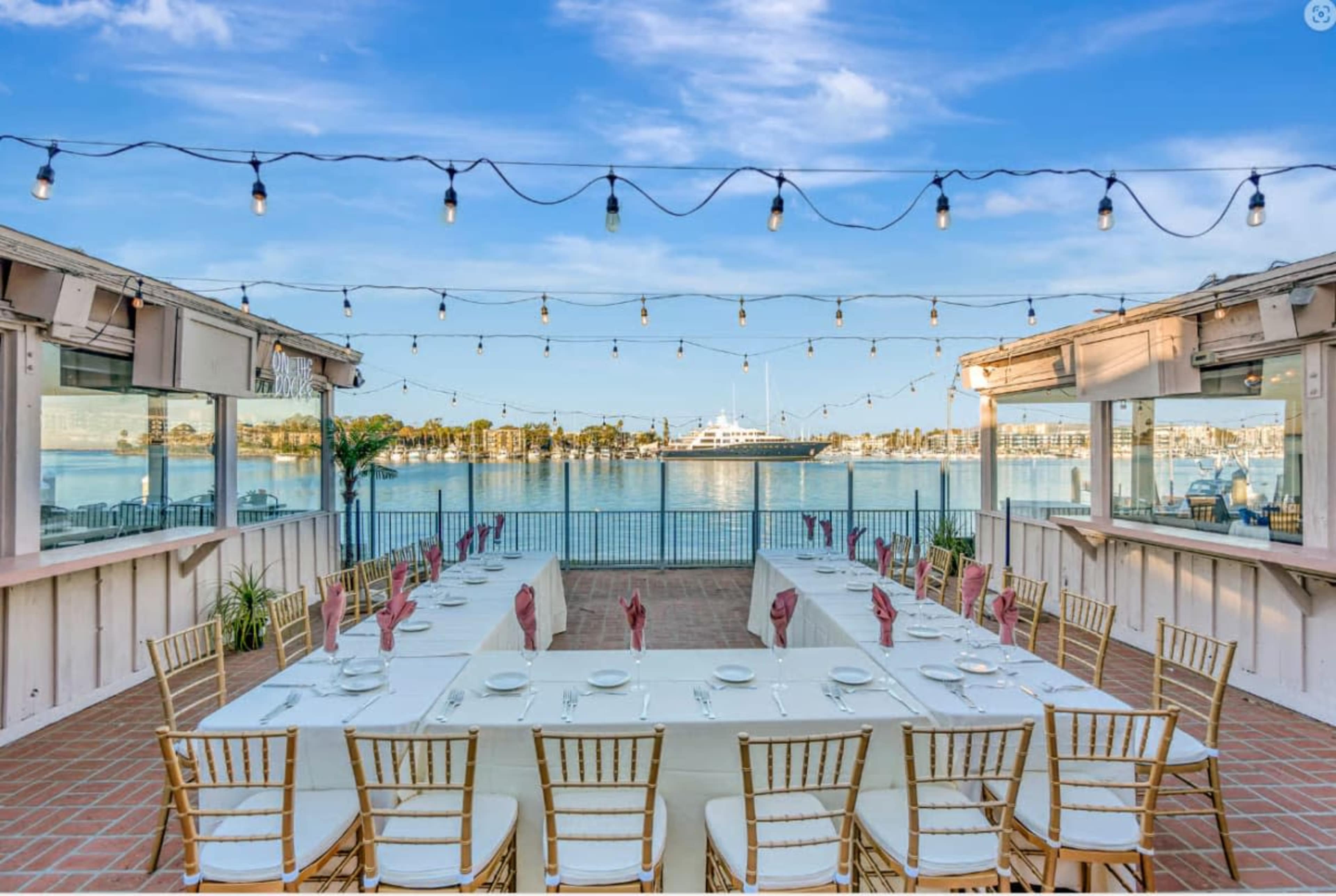 Waterfront Restaurant with Expansive Patio Featuring Views of Sparkling Water, Yachts, and Sealife Image in Marina del Rey, Marina Del Rey, CA