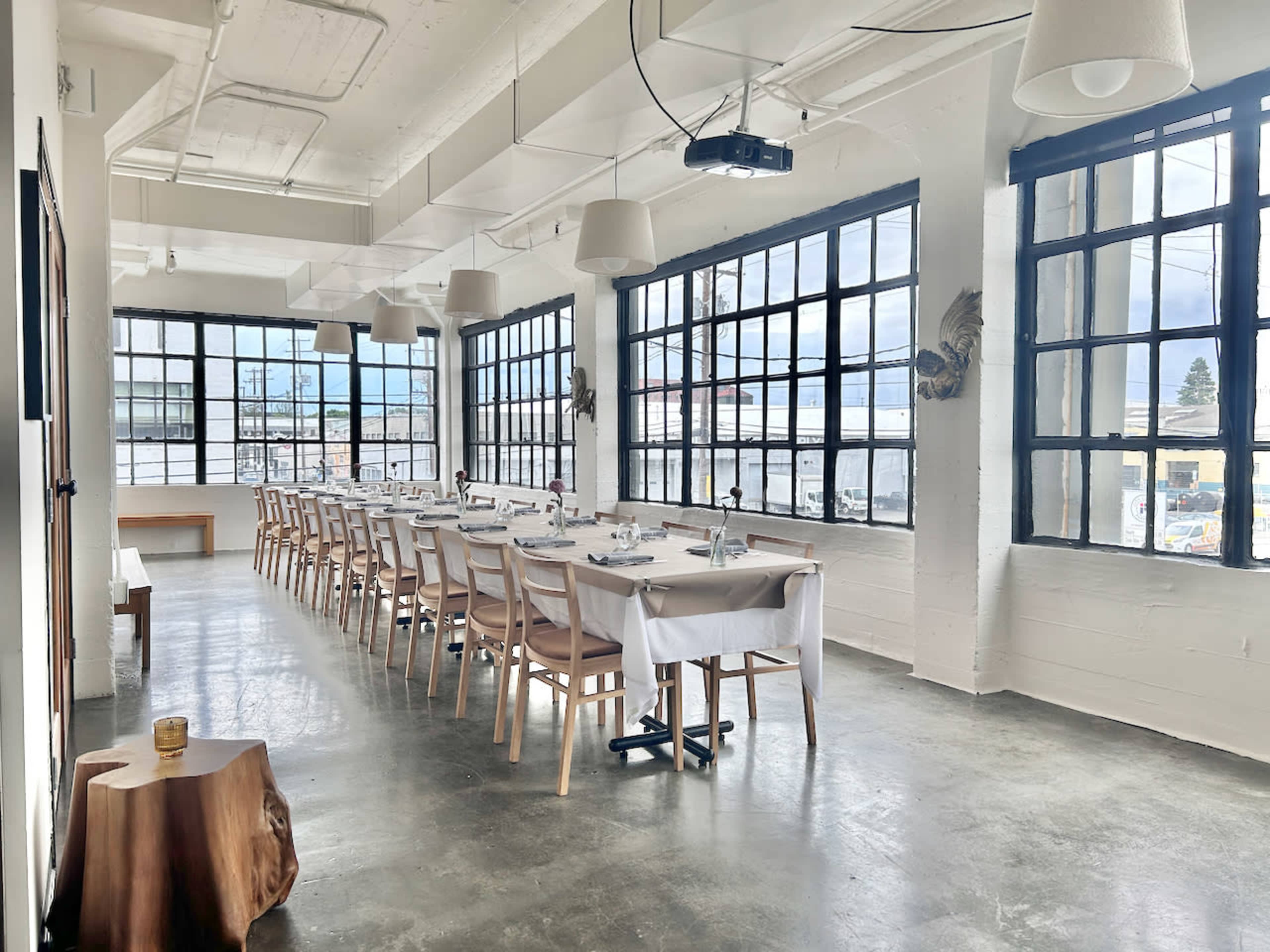 Elegant Industrial Space with Warm Lighting & Open Layout Image in Southeast Portland, PORTLAND, OR