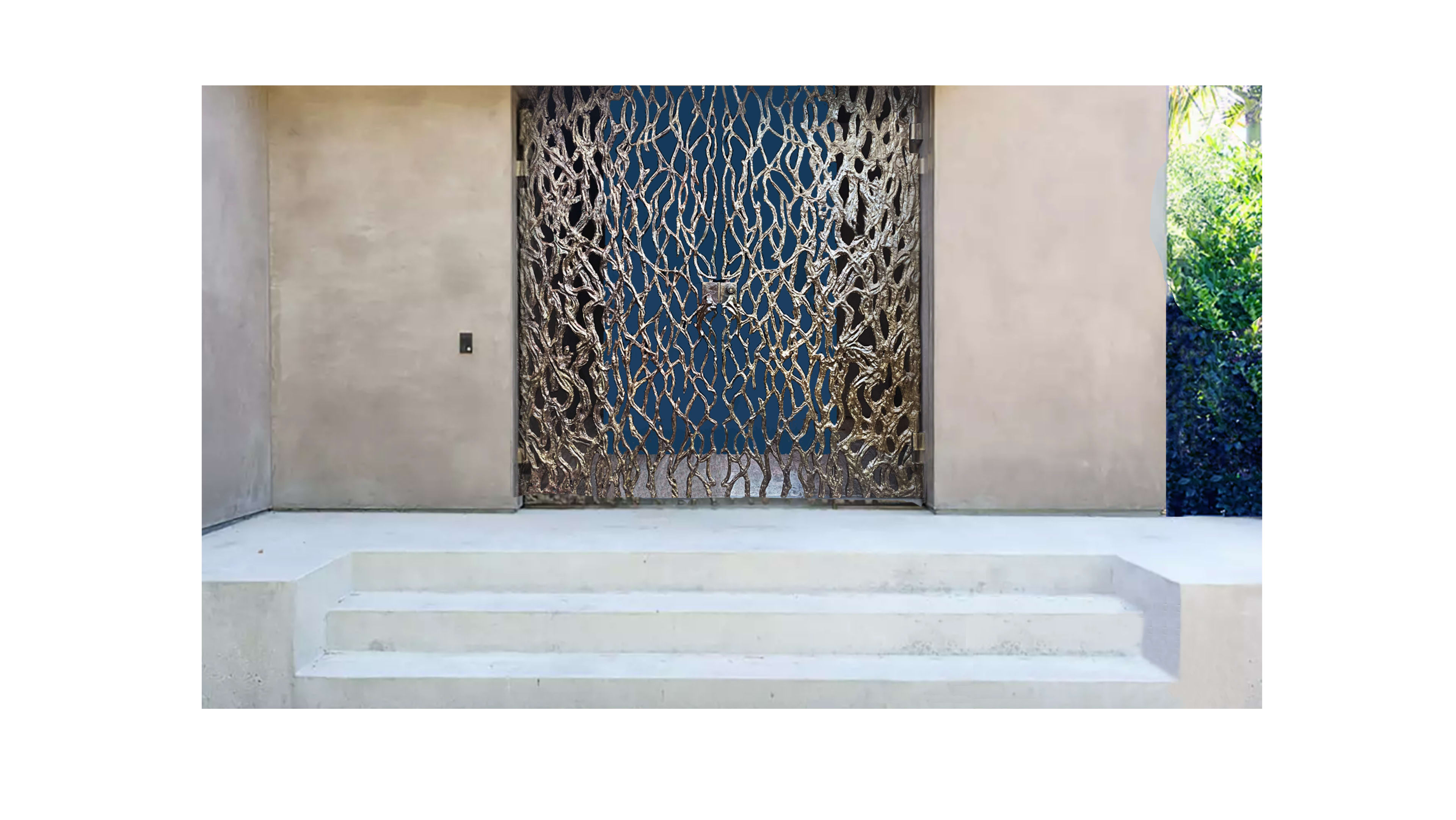 The image features a decorative metal gate with an intricate design, set against a plain wall, leading to a blue door and flanked by concrete steps.