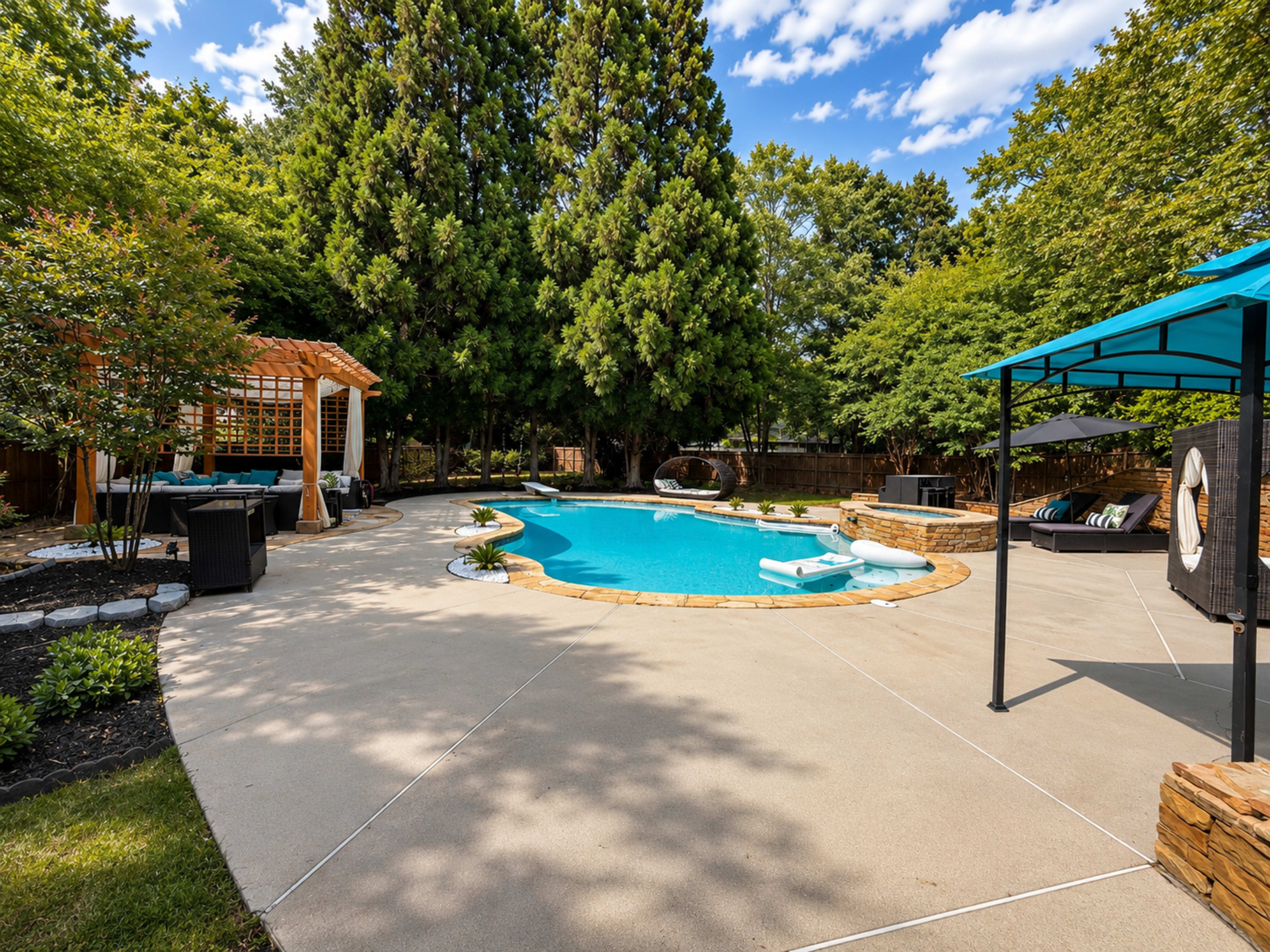 The image shows a backyard pool area with a blue swimming pool, lounge chairs, a gazebo, and surrounding greenery.
