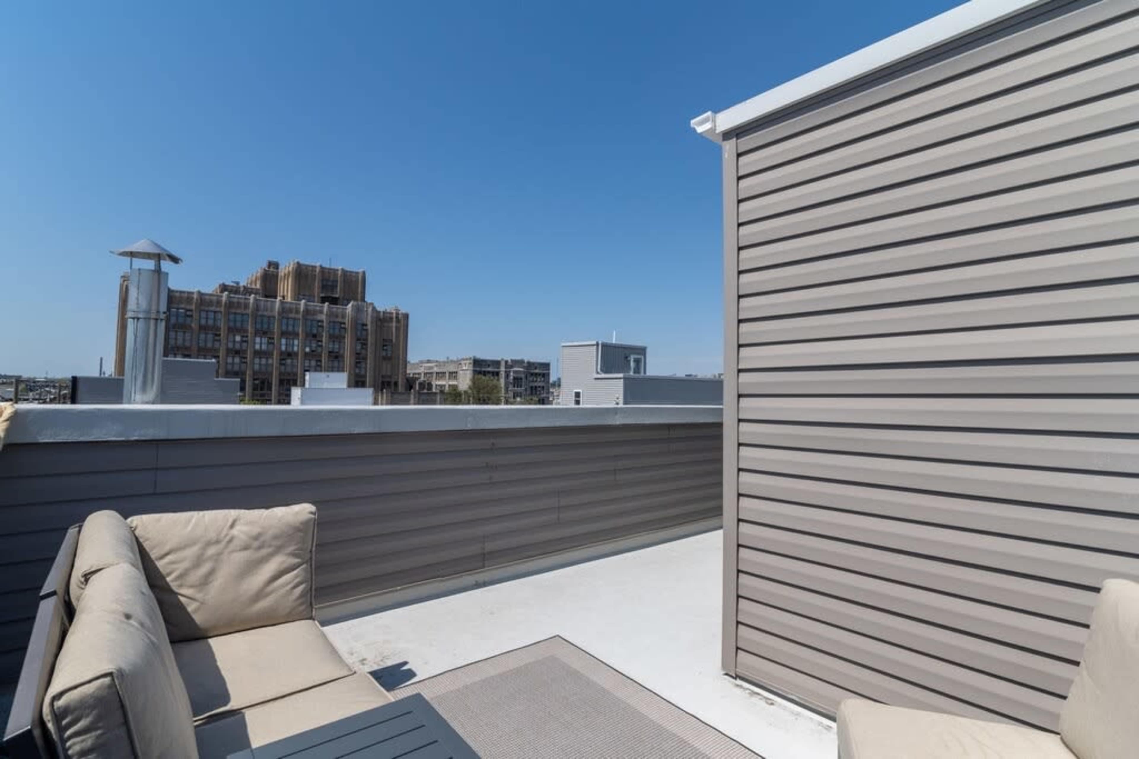 Urban Loft Oasis with Beautiful Natural Light, Piano, & Rooftop with Skyline Views. Image in East Passyunk Crossing, Philadelphia, PA
