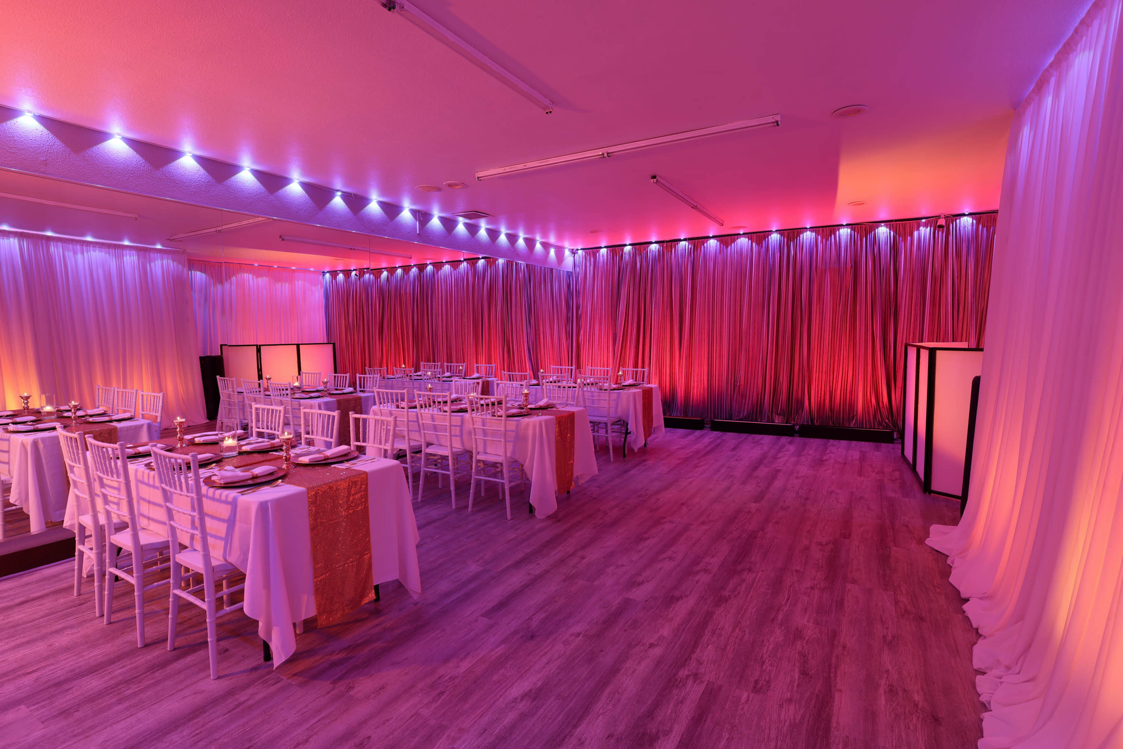Intimate  Event Space with Custom Lighting Image in French Court, Santa Ana, CA