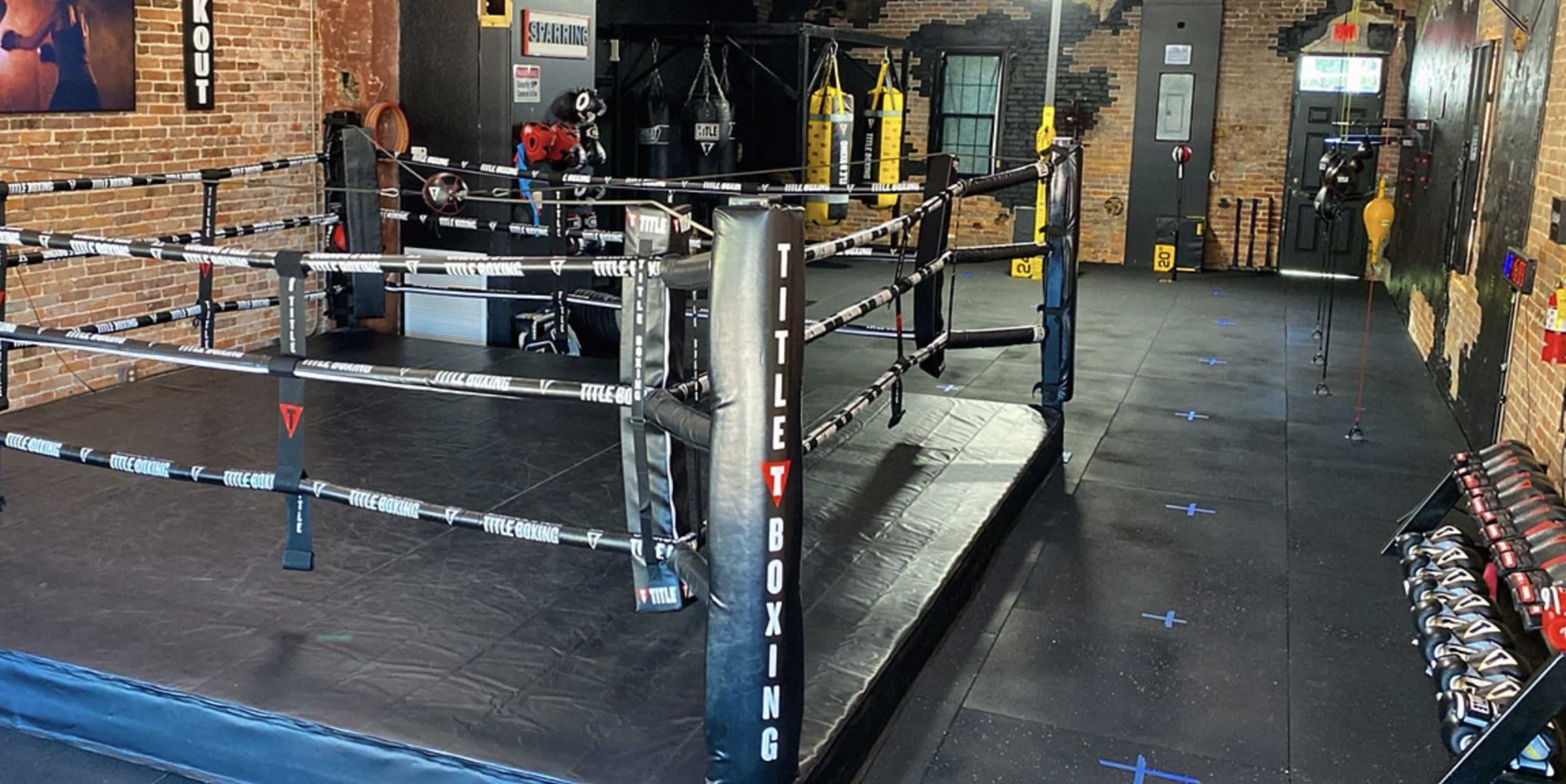 Full Boxin Gym / Boxing Ring / Punching Bags / Weights Area (Old Bricks Walls) (Black Walls) Downtown Saint Cloud Fl Image in St. Cloud, Saint Cloud, FL