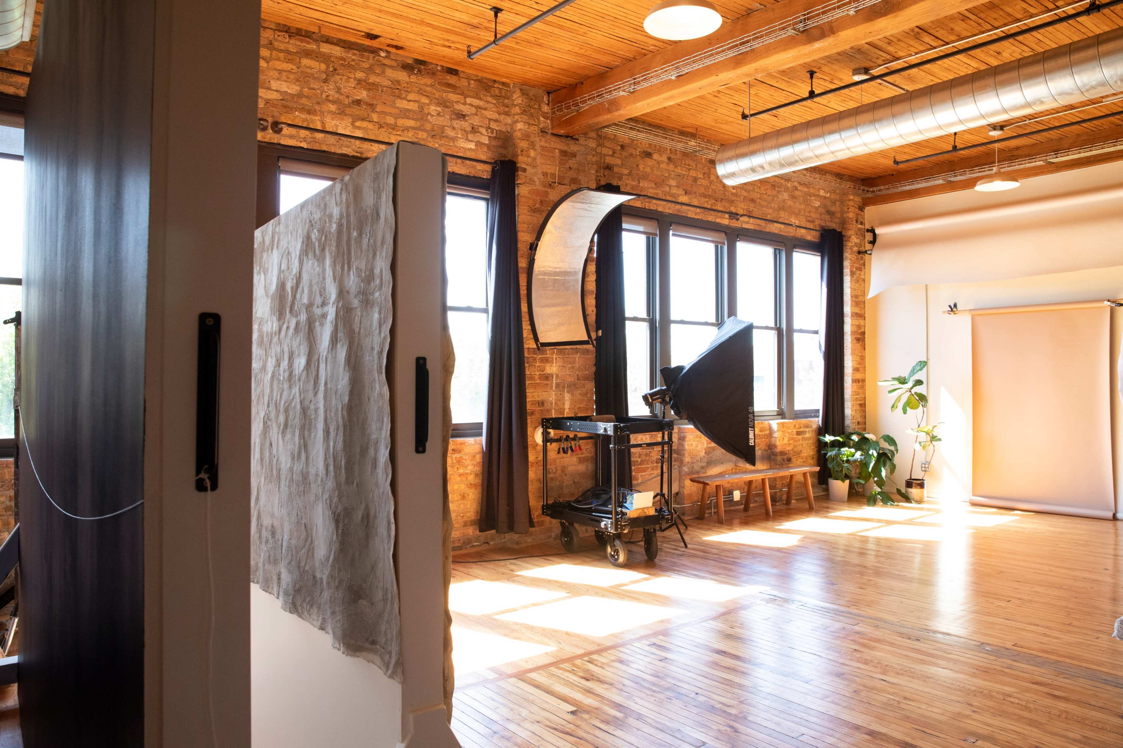 Loft-style photo studio with a stunning wall of windows Image in Lake View, CHICAGO, IL