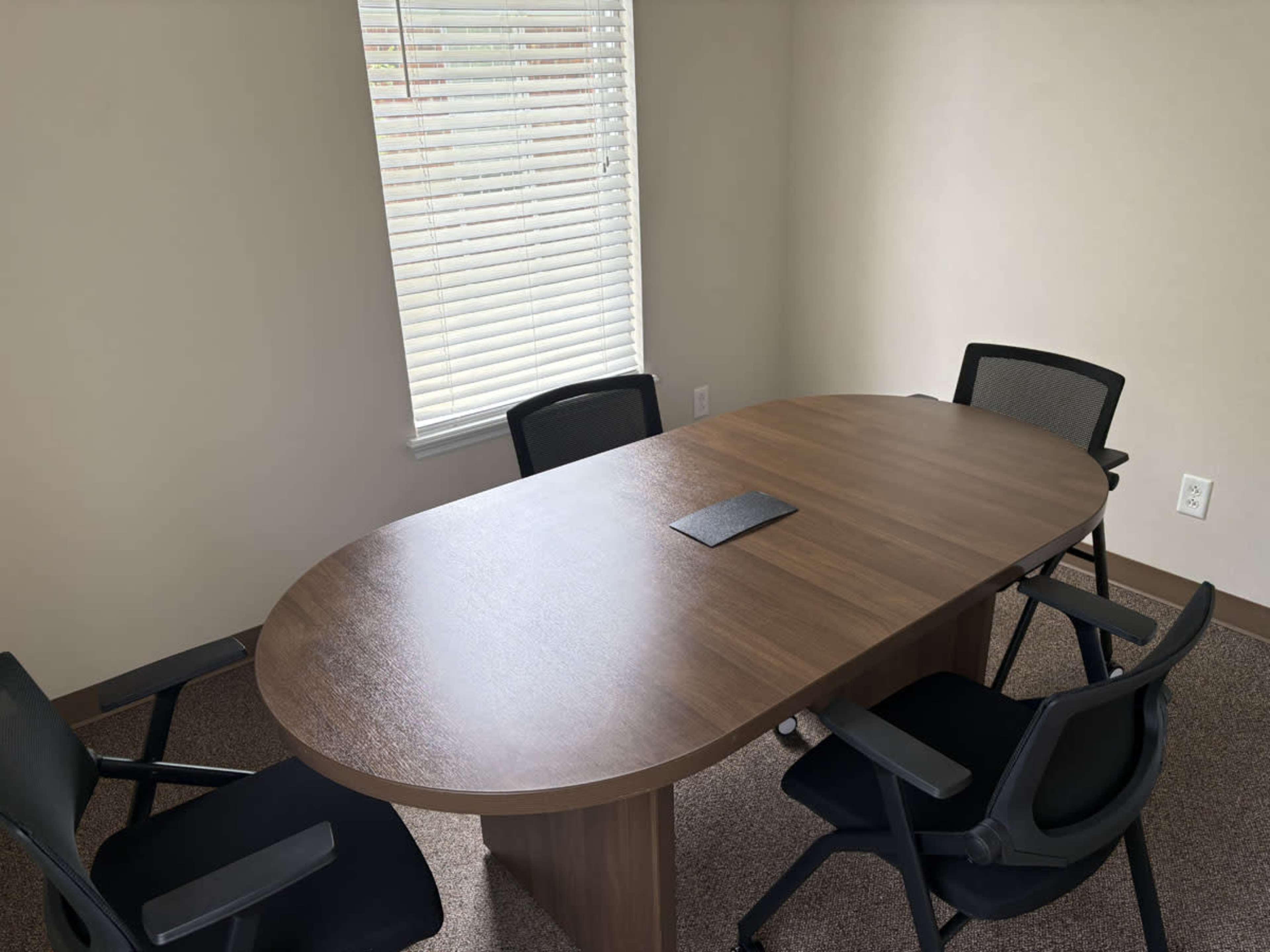 Small boardroom-style conference room in St. Peters, MO. Image in O'Fallon Township, St. Peters, MO