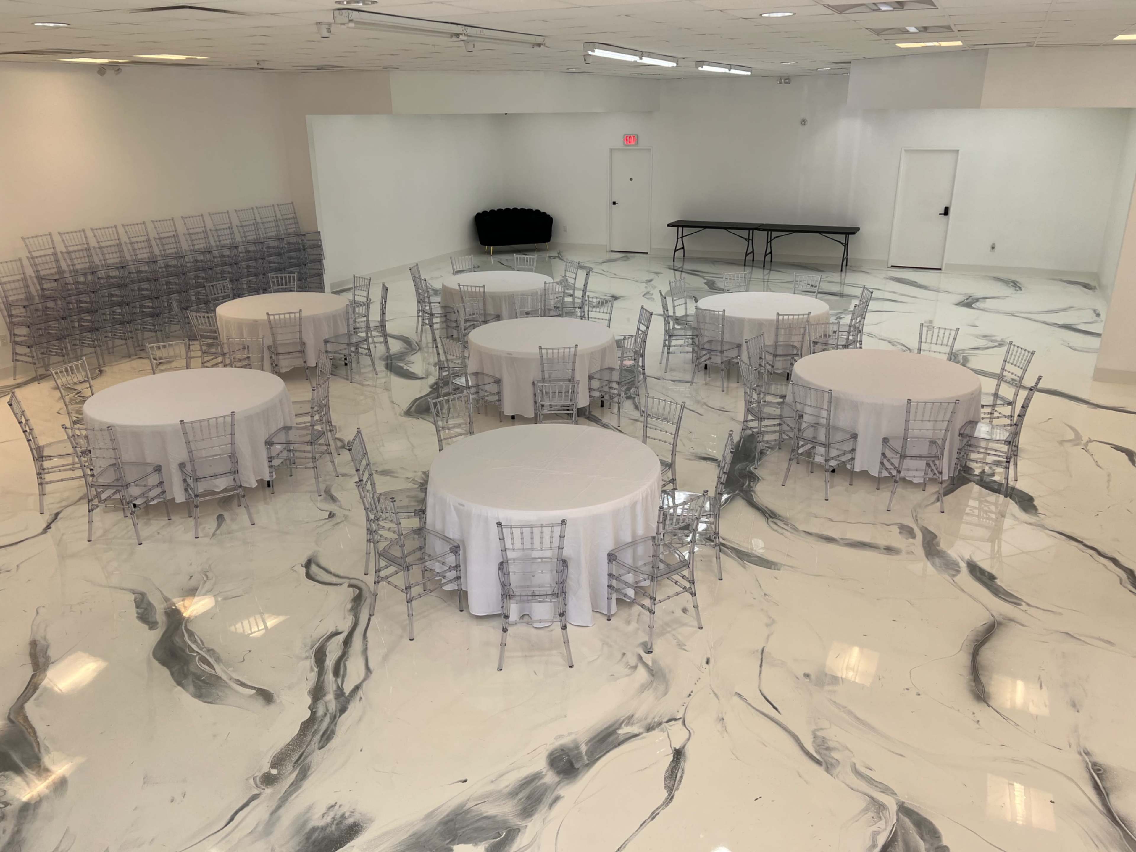 Contemporary event venue with a stunning all white aesthetic. Image in Town N Country Alliance, Tampa, FL