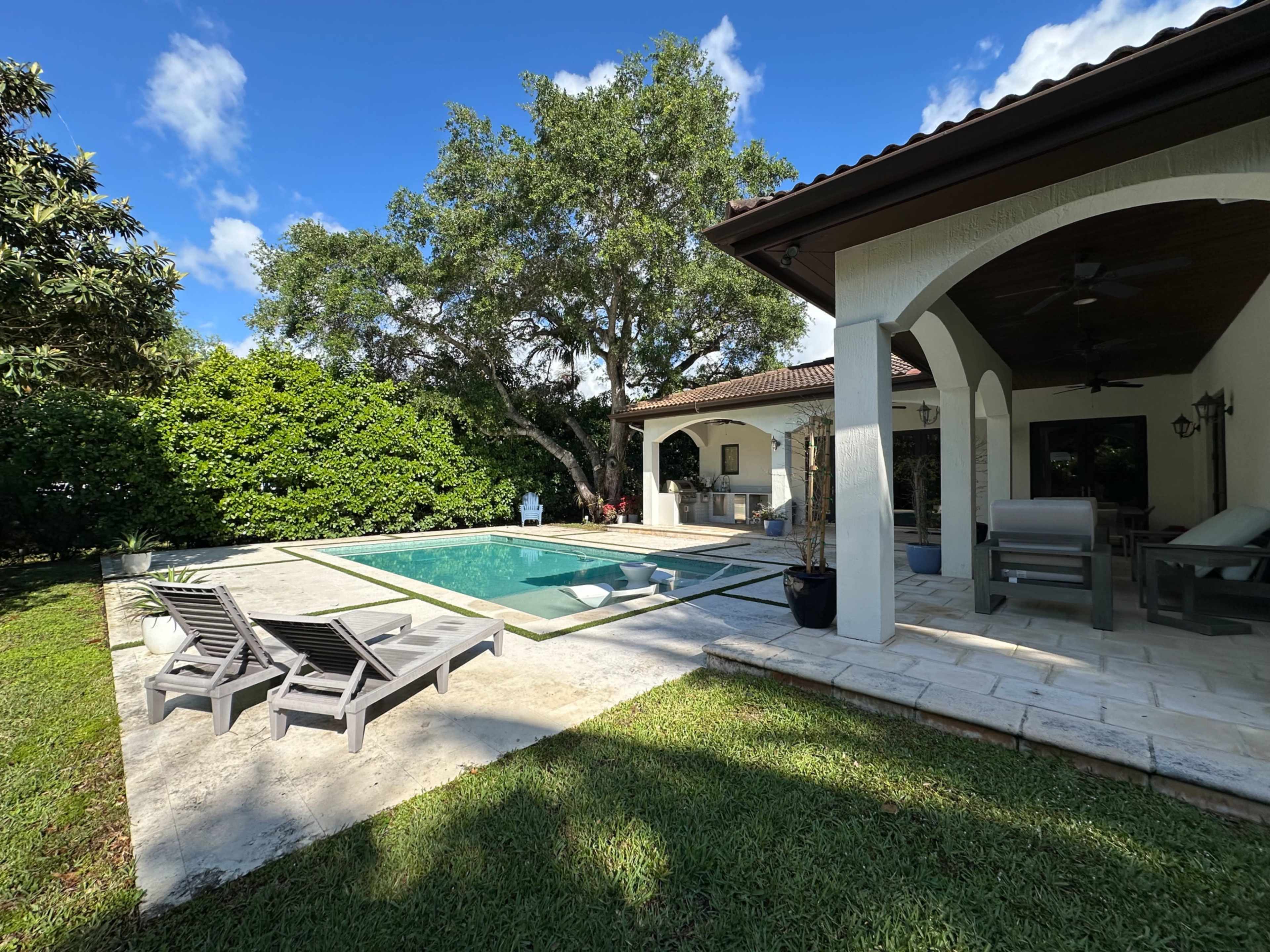 Private Garden Retreat with Pool, Oak Trees & Outdoor Kitchen Image in Glenvar Heights, Miami, FL
