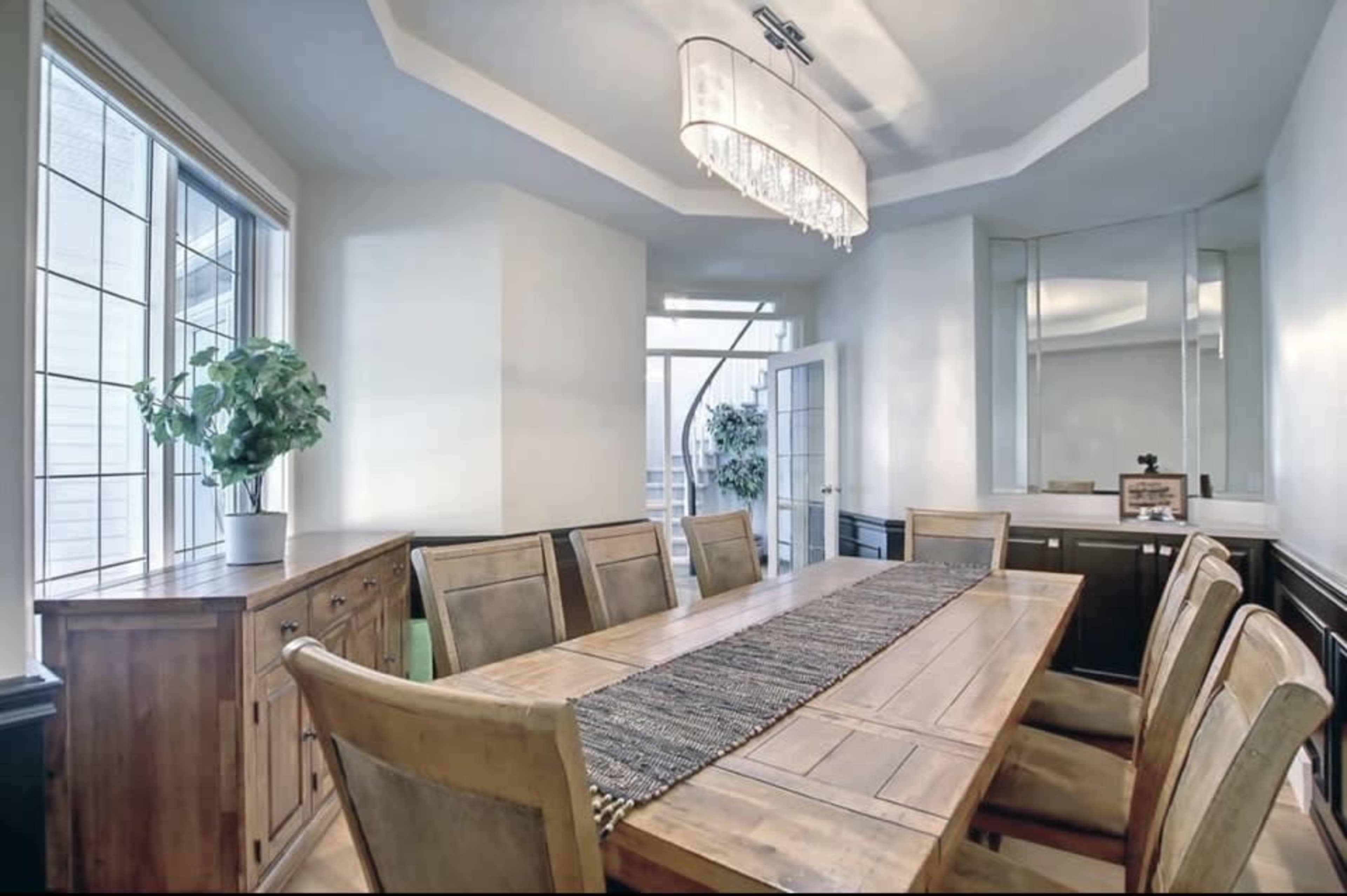 Huge house with over 3000 square feet. An unground beautiful tiled pool with loads of pool toys lights and games. Outdoor speakers and Hottub!!!! Image in Douglasdale, Calgary, AB
