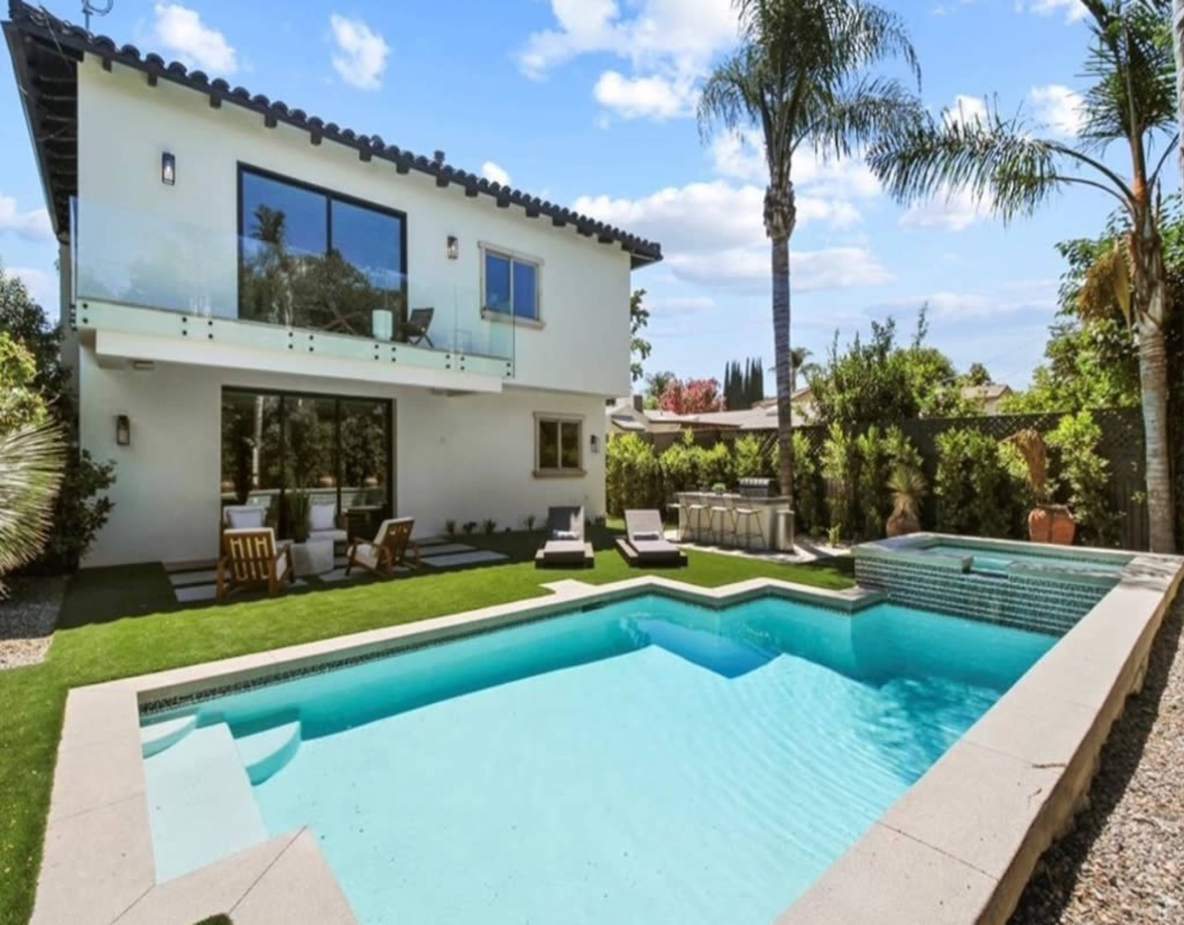 OTSEGO SPANISH MODERN OASIS/ POOL/PALM LINED YARD Image in Sherman Oaks, Los Angeles, CA