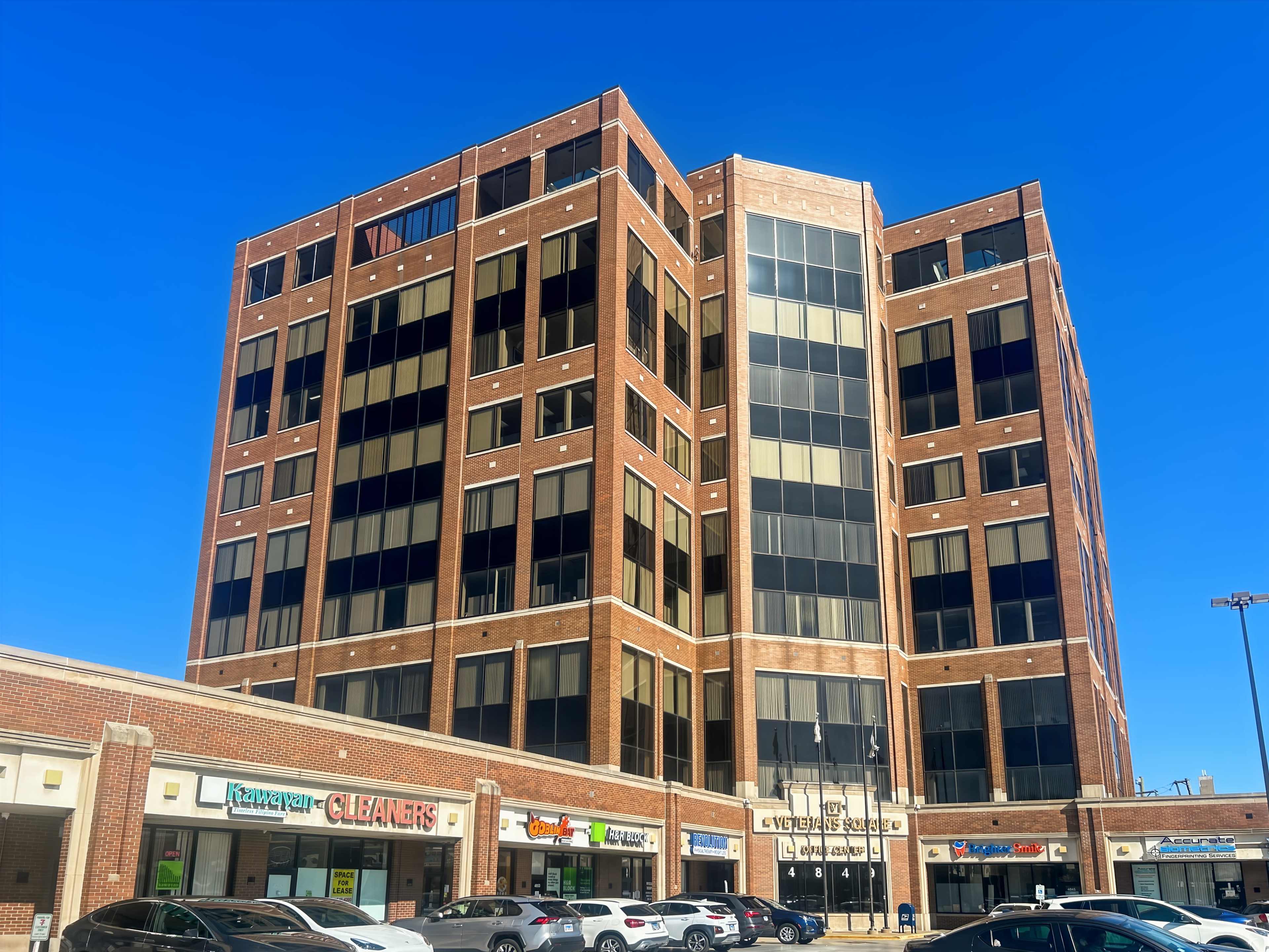 Professional 14-person Meeting Room with 100 inch TV Image in Jefferson Park, Chicago, IL