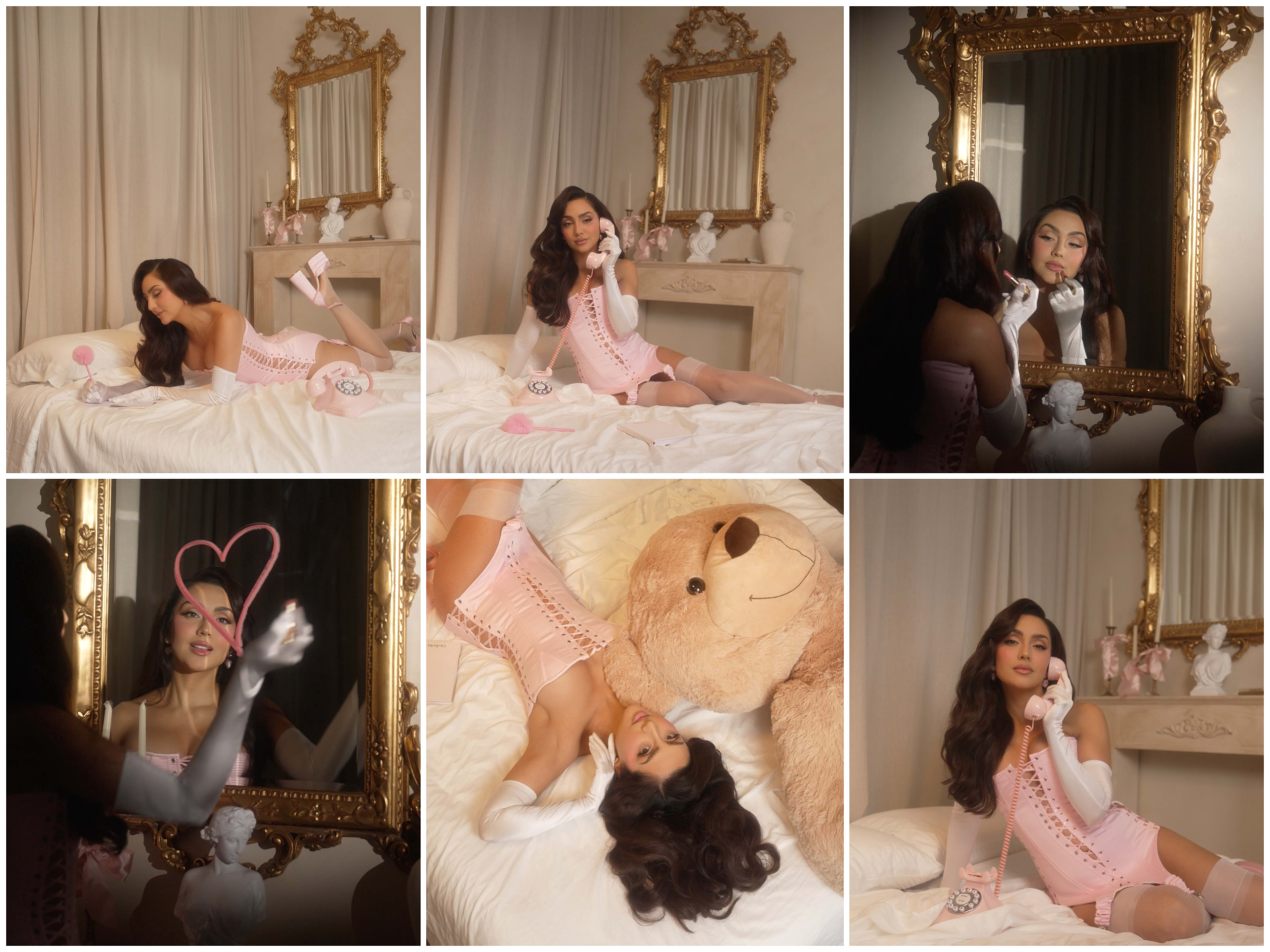A woman in a pink outfit poses on a bed with a large teddy bear and is seen using a vintage phone, while another person applies makeup in a mirror nearby.