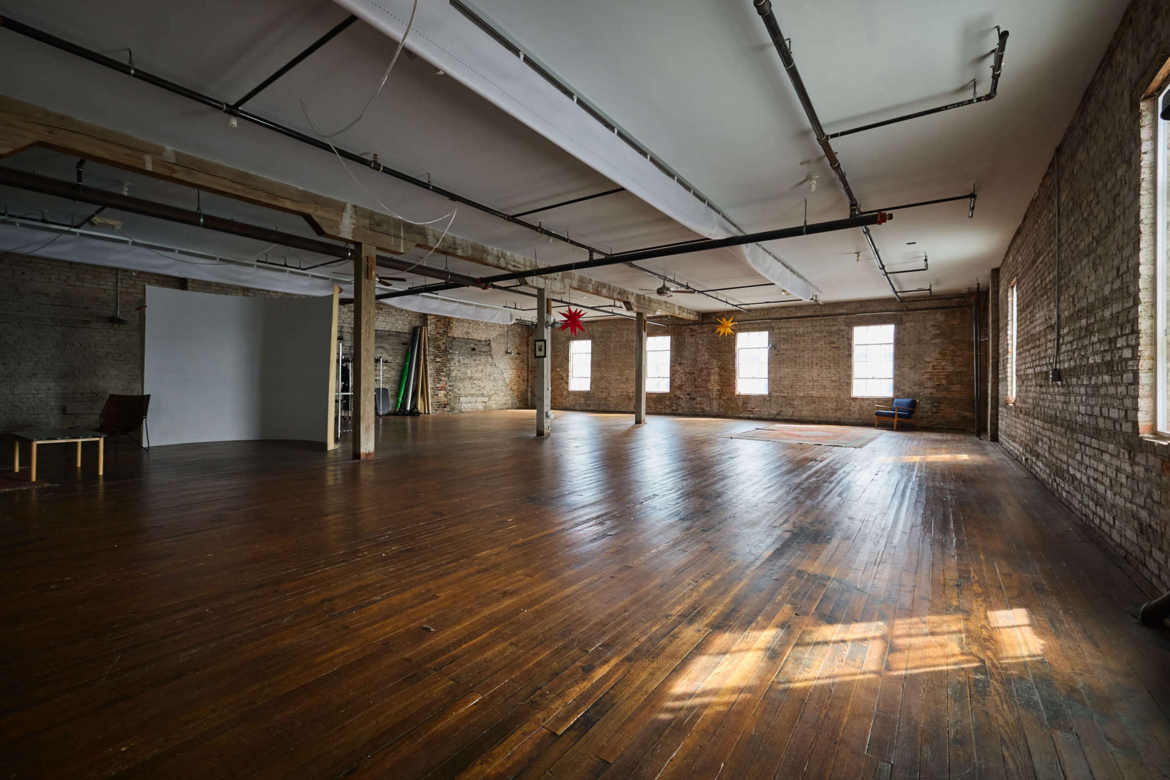 Historic Loft Photo Studio with Natural Light and Beautiful Exposed Brick Image in Burlington, Burlington, NC