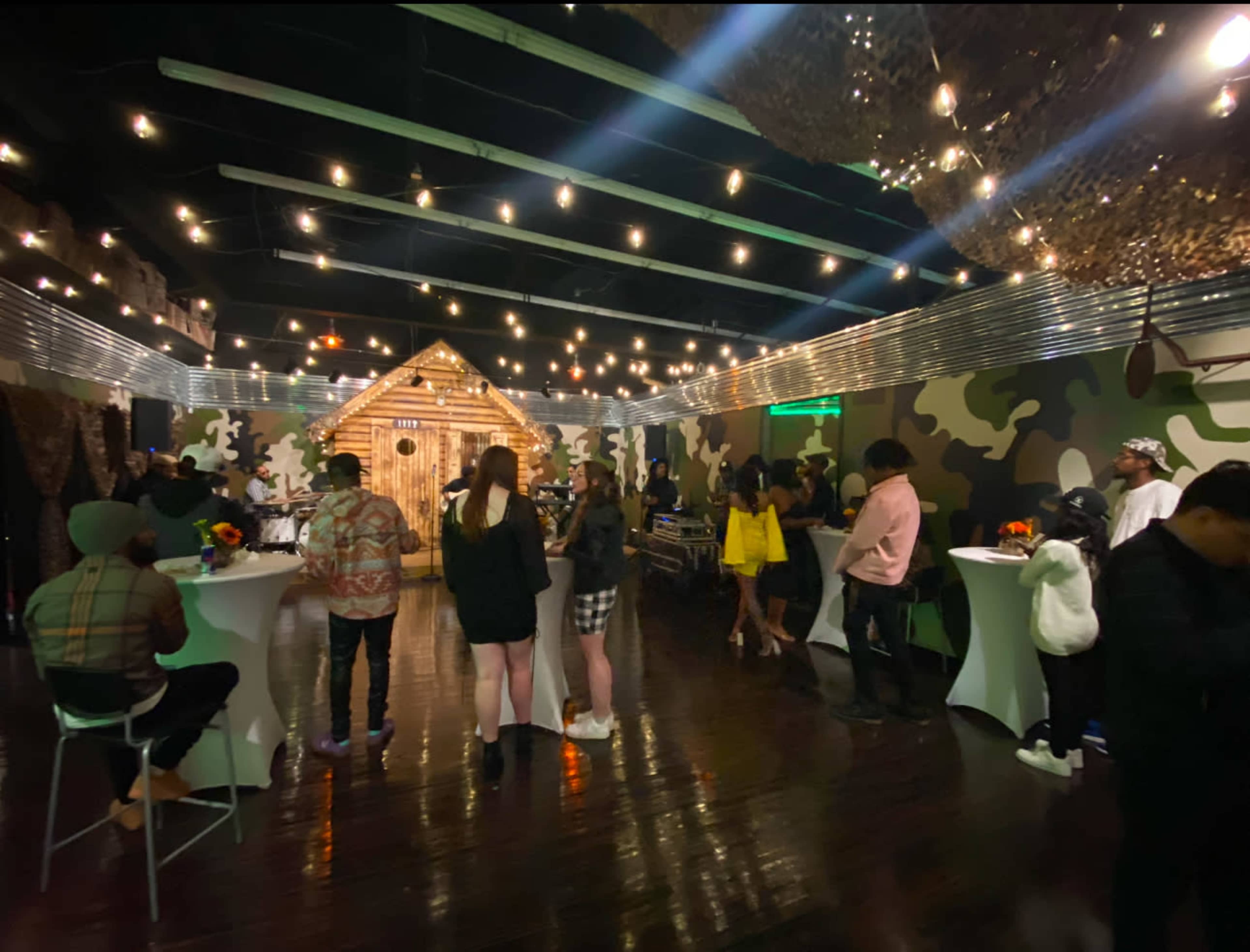Indoor/Outdoor Ambience, prop log cabin with porch/stage, venue Image in Winston-Salem, Winston-Salem, NC