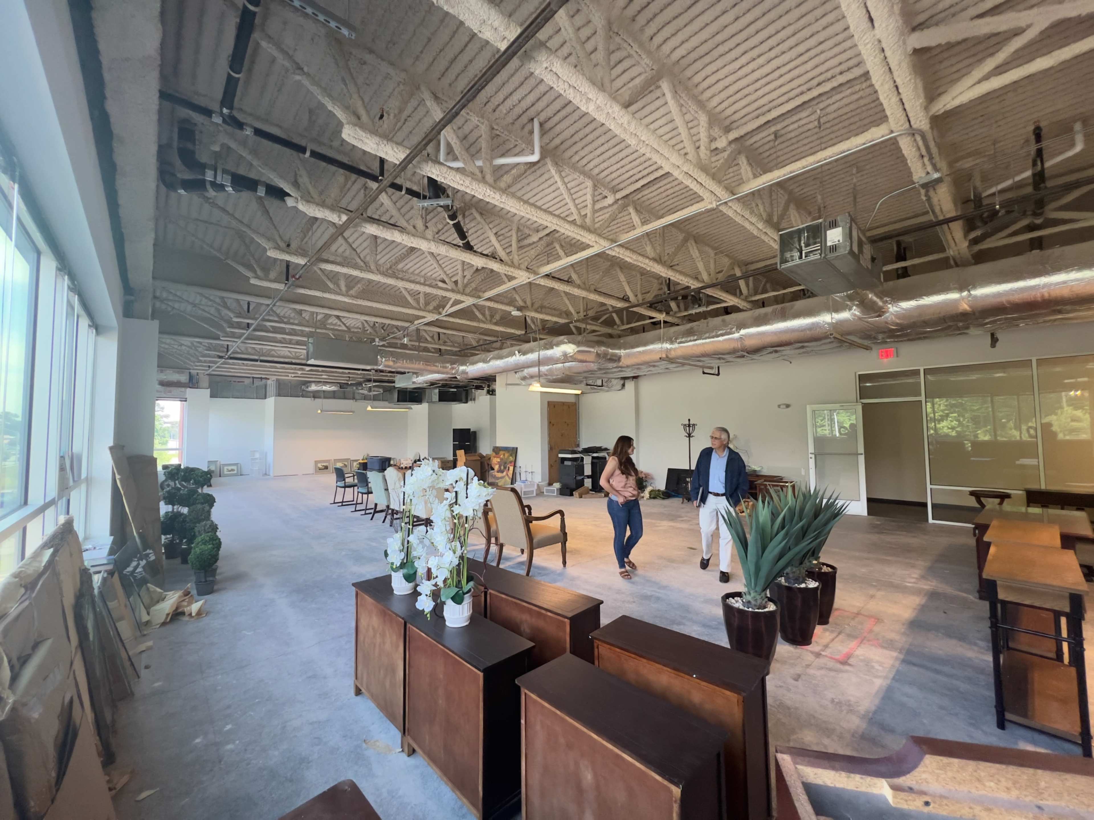 Industrial Studio space, white walls, concrete floors, high ceilings. Image in Central Newport News, Newport News, VA