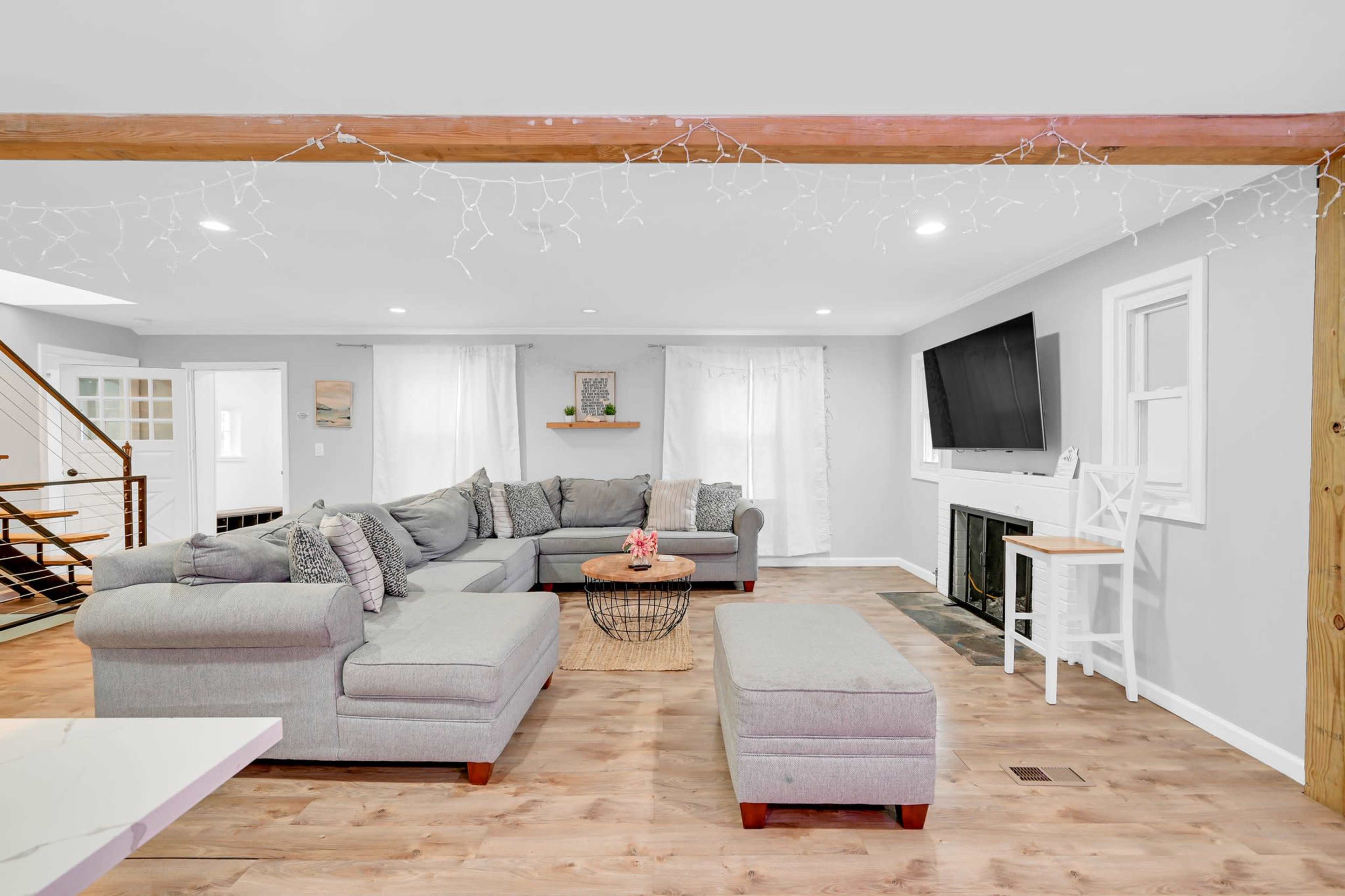 Modern Open Concept Entire single family home with basketball court and full deck in the back yard. Small creek runs as well on side of property. Image in Englewood, Englewood, NJ