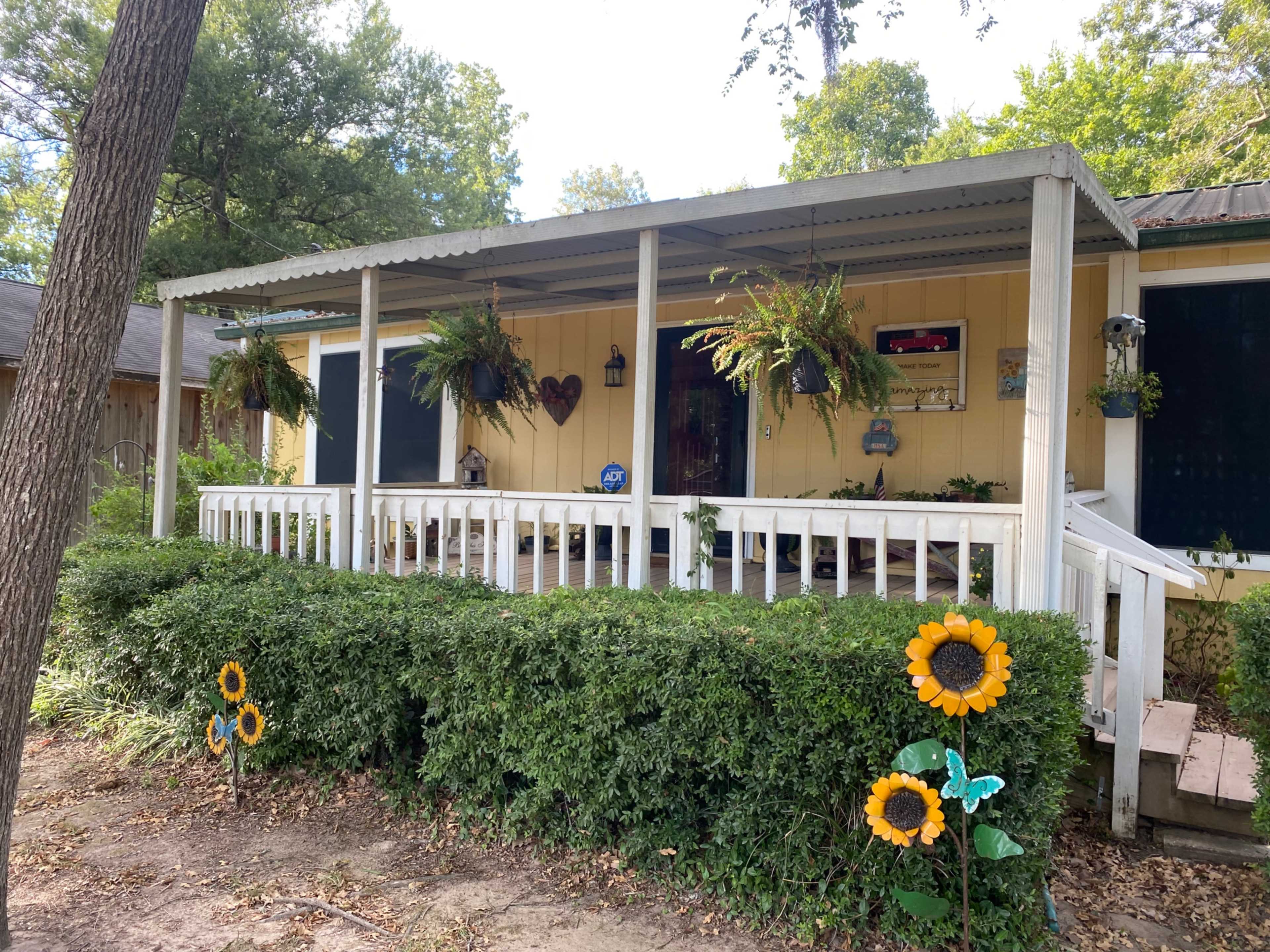 Lake area home with large gazebo and fenced backyard. Image in West Livingston, Livingston, TX