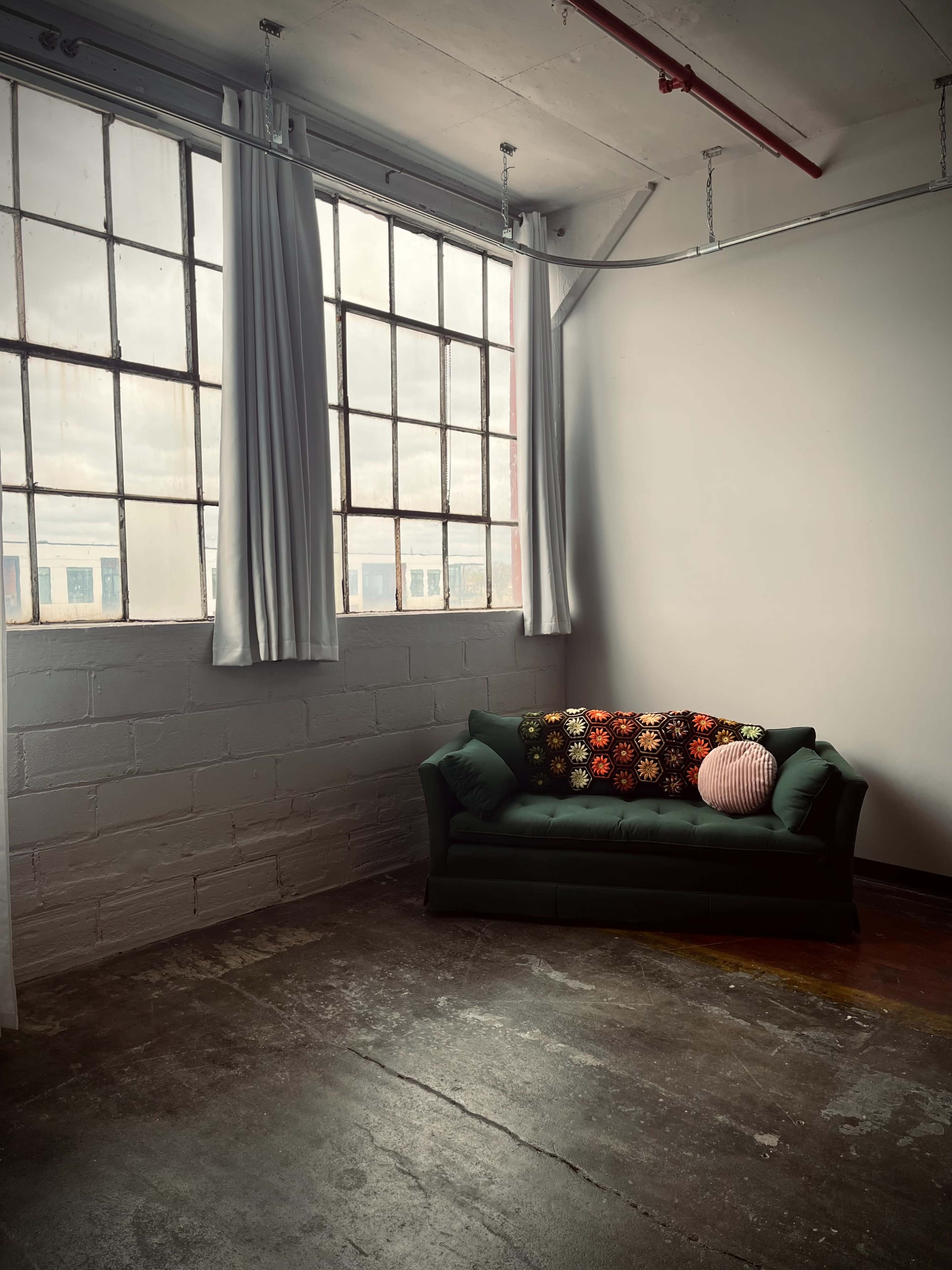 Natural Light-Filled Warehouse Studio with Harbor Skyline View Image in Bay View, Milwaukee, WI