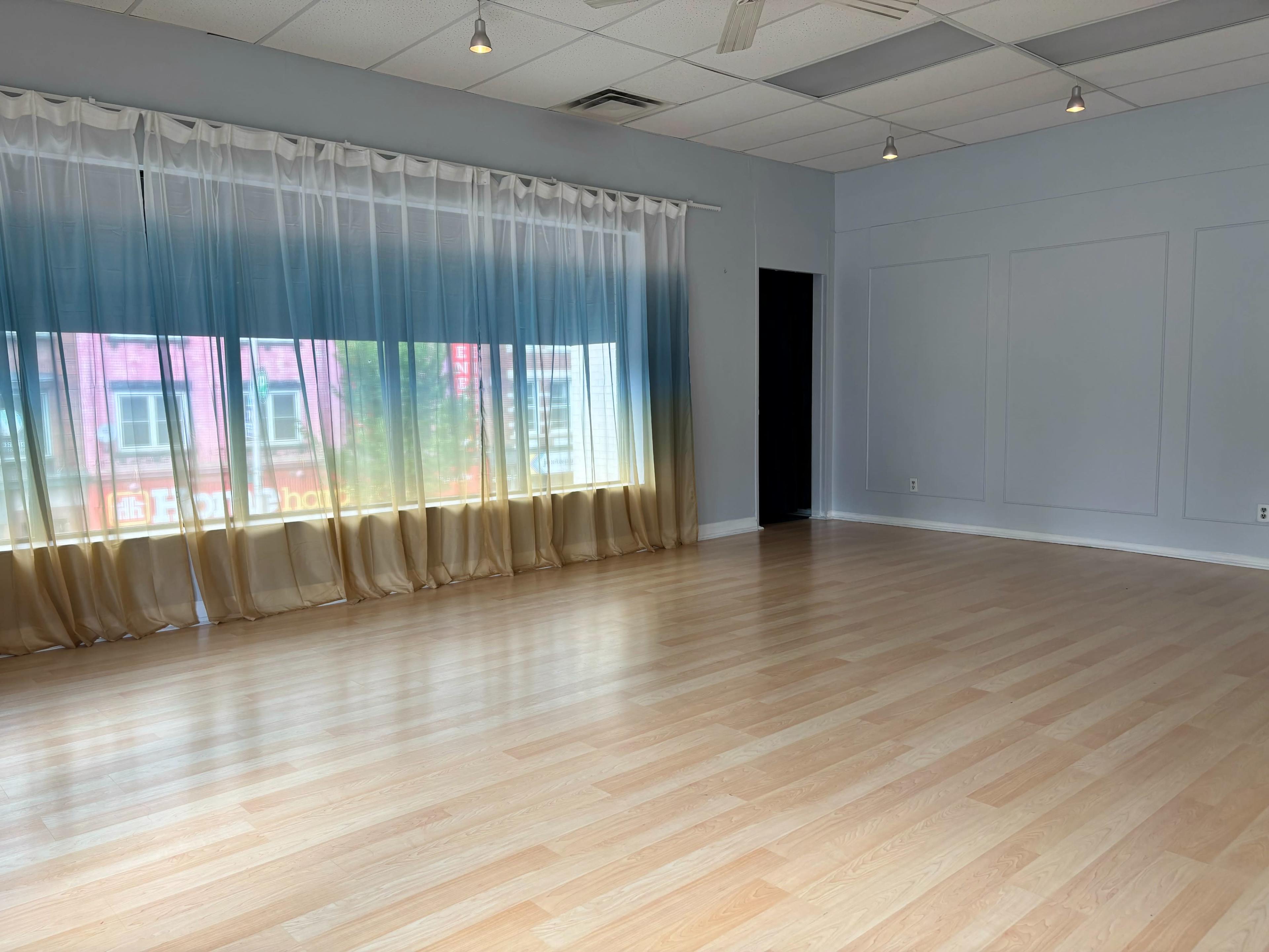 Sunny Dance & Yoga Studio with Ombré Curtains | Natural Light Haven Image in Harbord Village, Toronto, ON