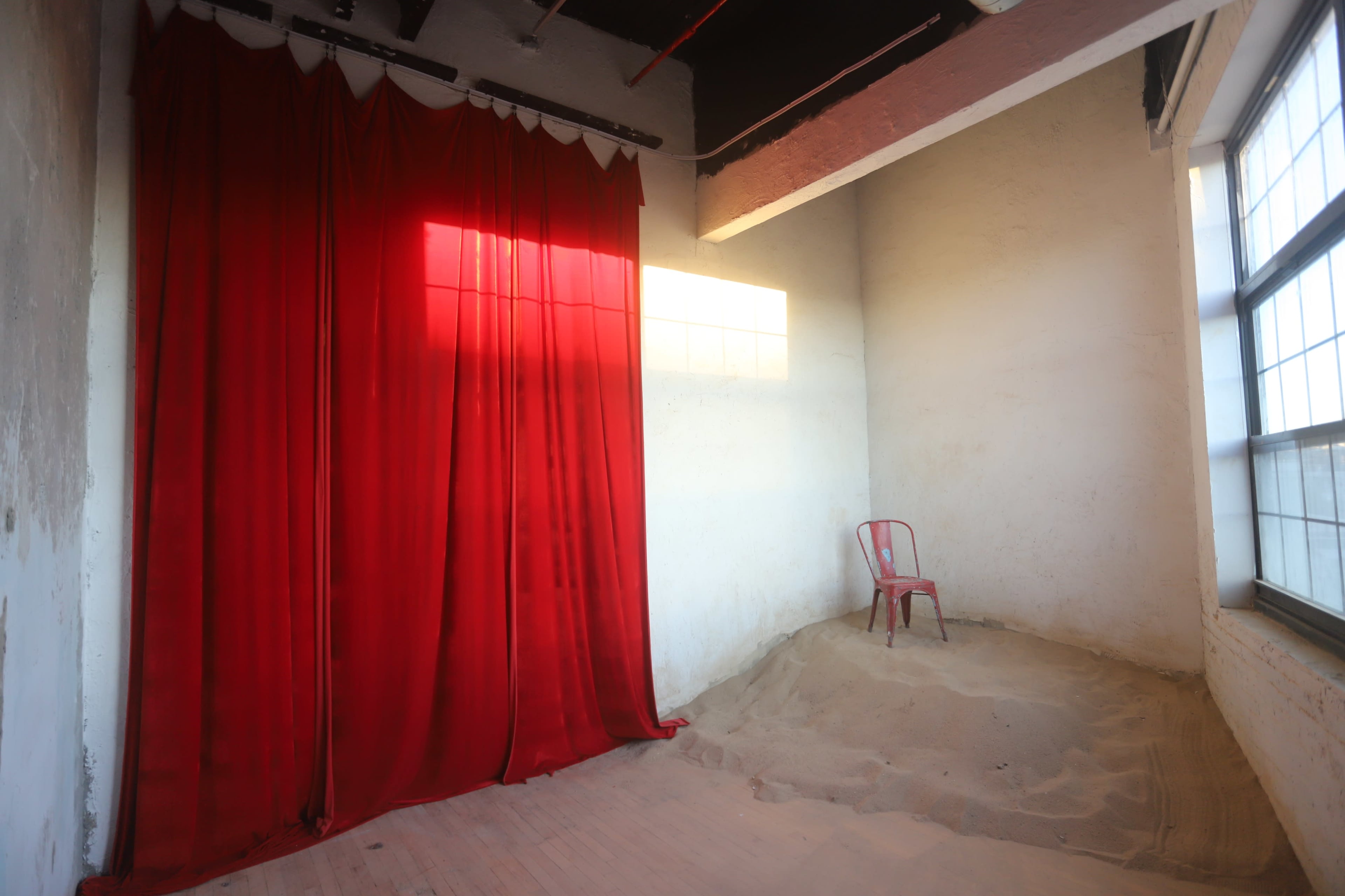 Sunny Photo Studio with Sand Image in Bushwick, Brooklyn, NY