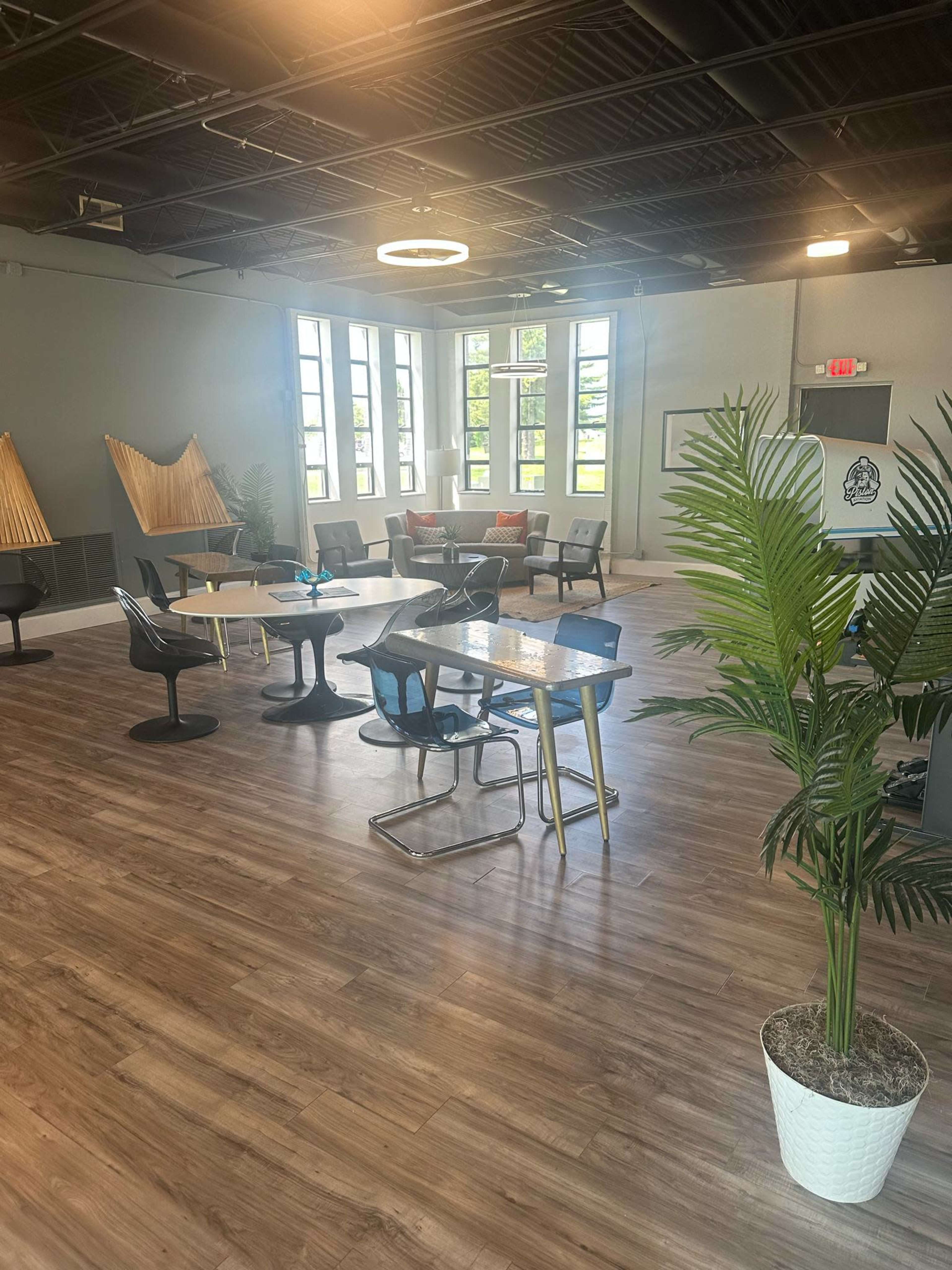 Modern Aviation Lounge with Runway Views + Retro Arcade Vibe Image in Wood River Township, East Alton, IL
