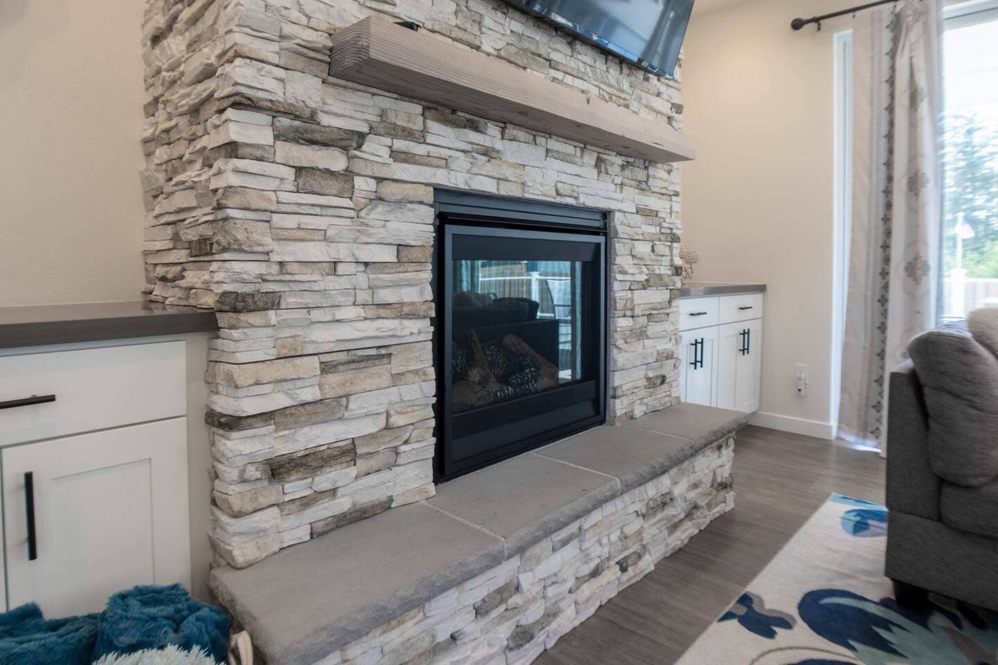 Modern Luxurious Large home with water views, large deck, bbq grill, firepit, gameroom, lots of yard space Image in Camano, Camano Island, WA