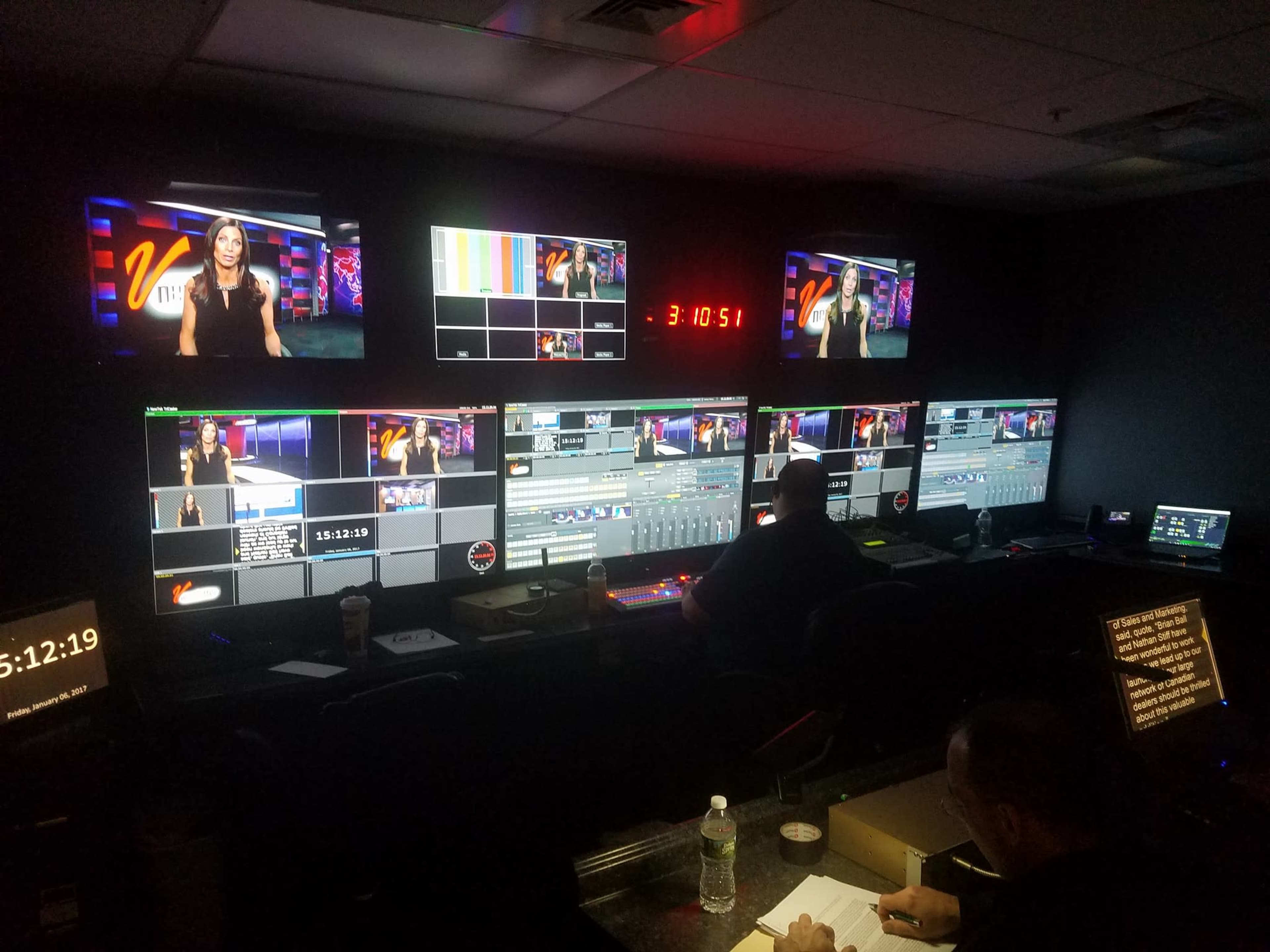 The image shows a video production control room with multiple monitors displaying live footage and a countdown timer.